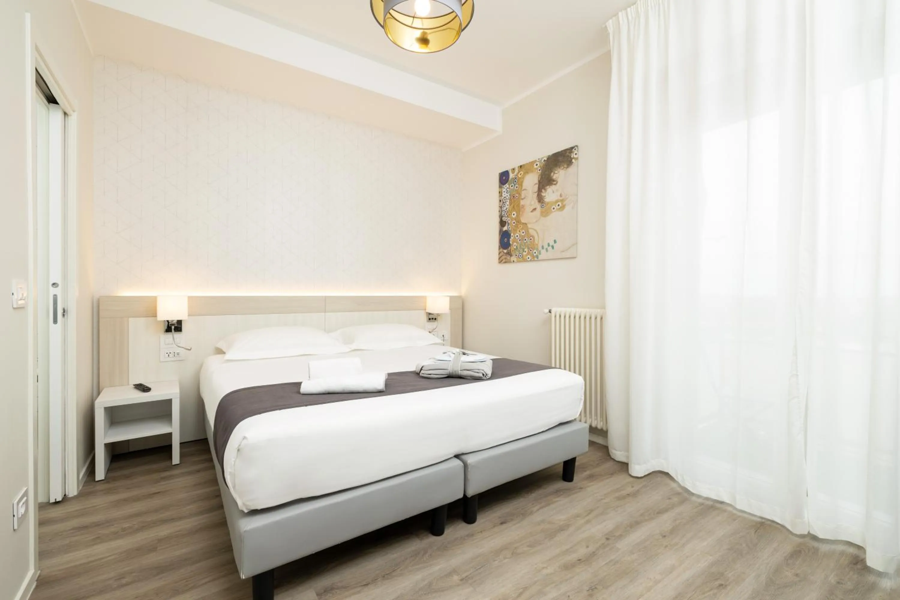 Bed in Hotel Maggiore