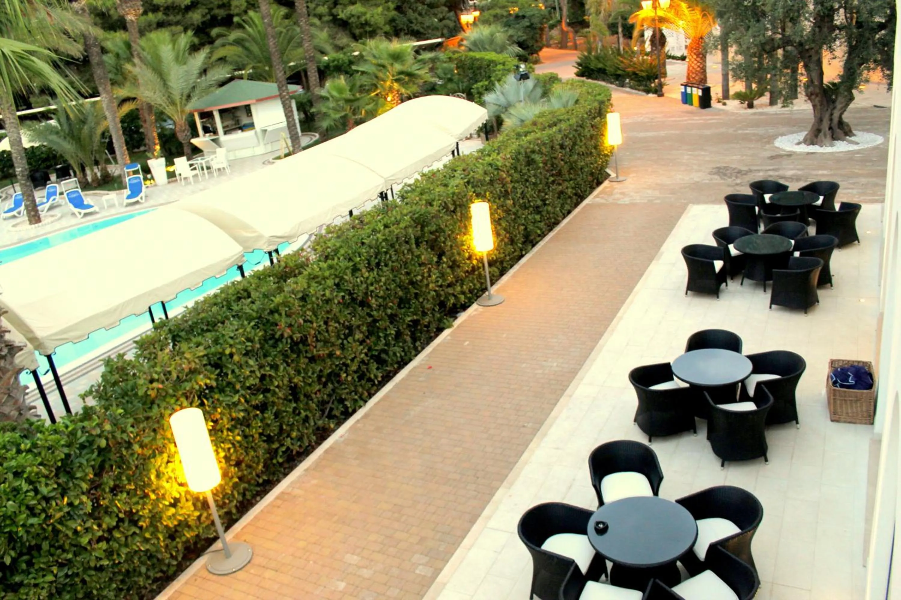 Patio in Giardino Dei Pini - Boutique Hotel