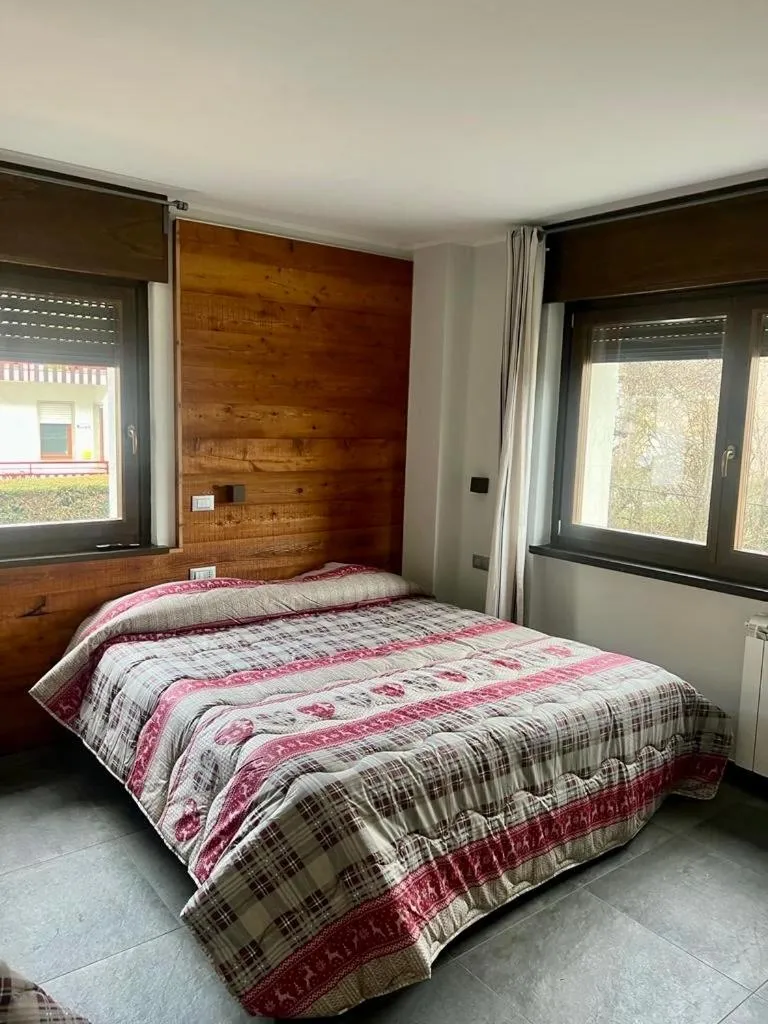 Bedroom, Bed in Appartamenti Bardonecchia