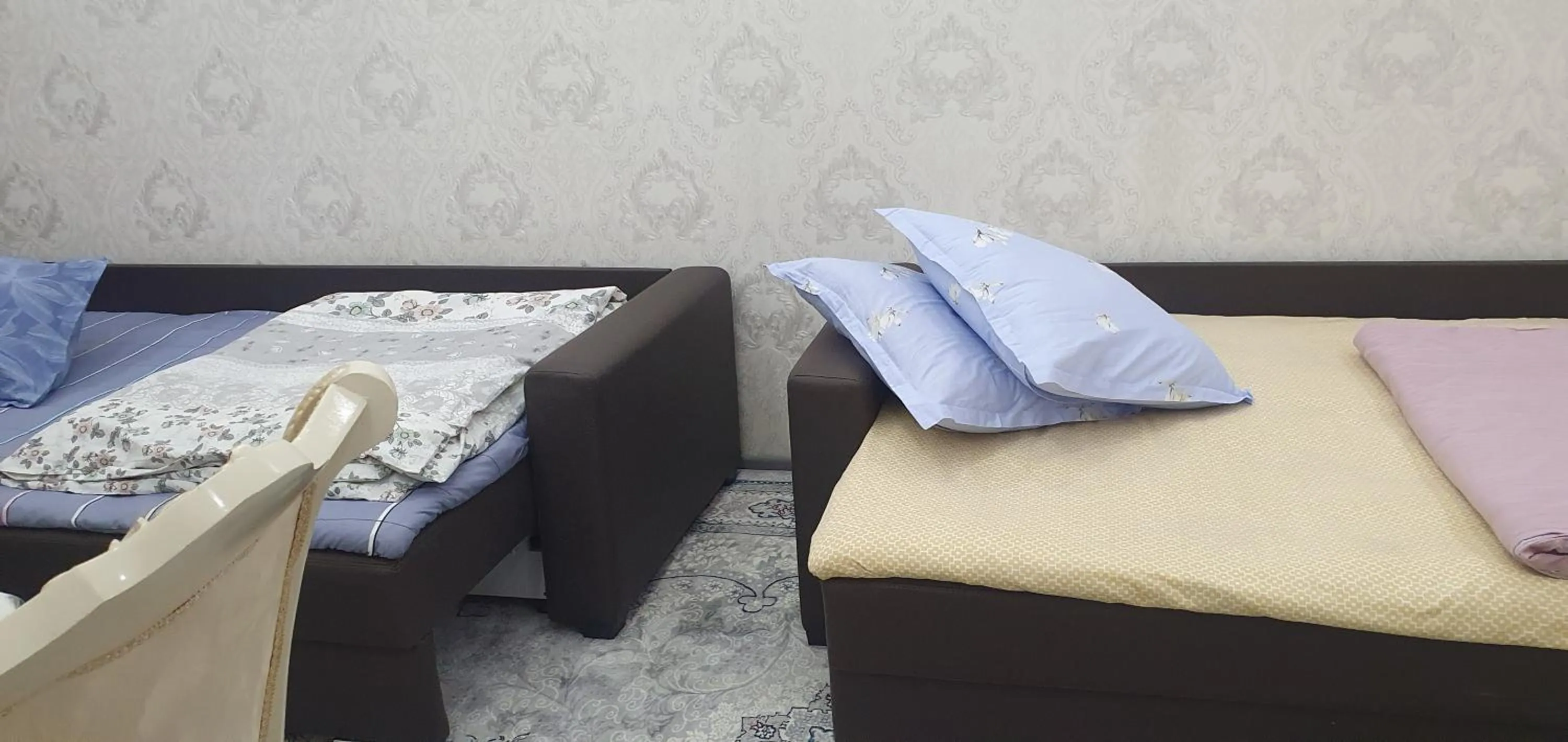 Bed in Fayzli GuestHouse