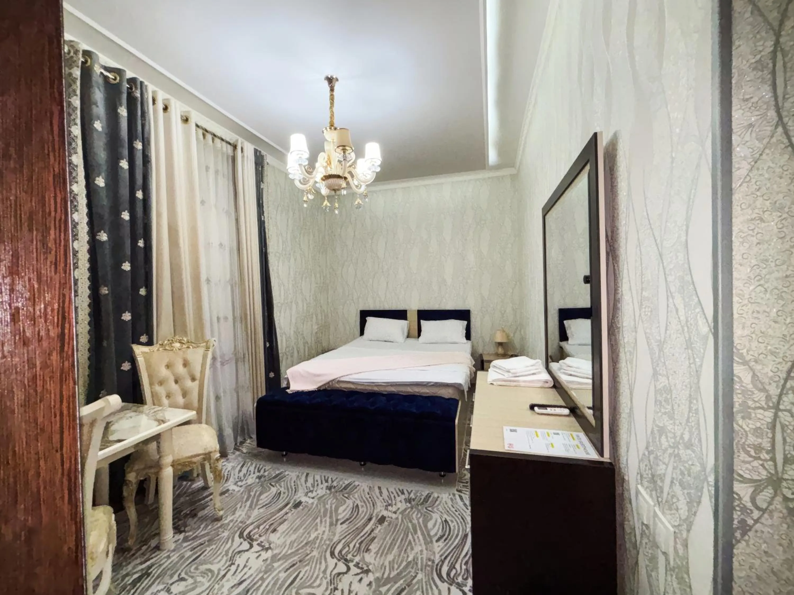 Bed in Fayzli GuestHouse