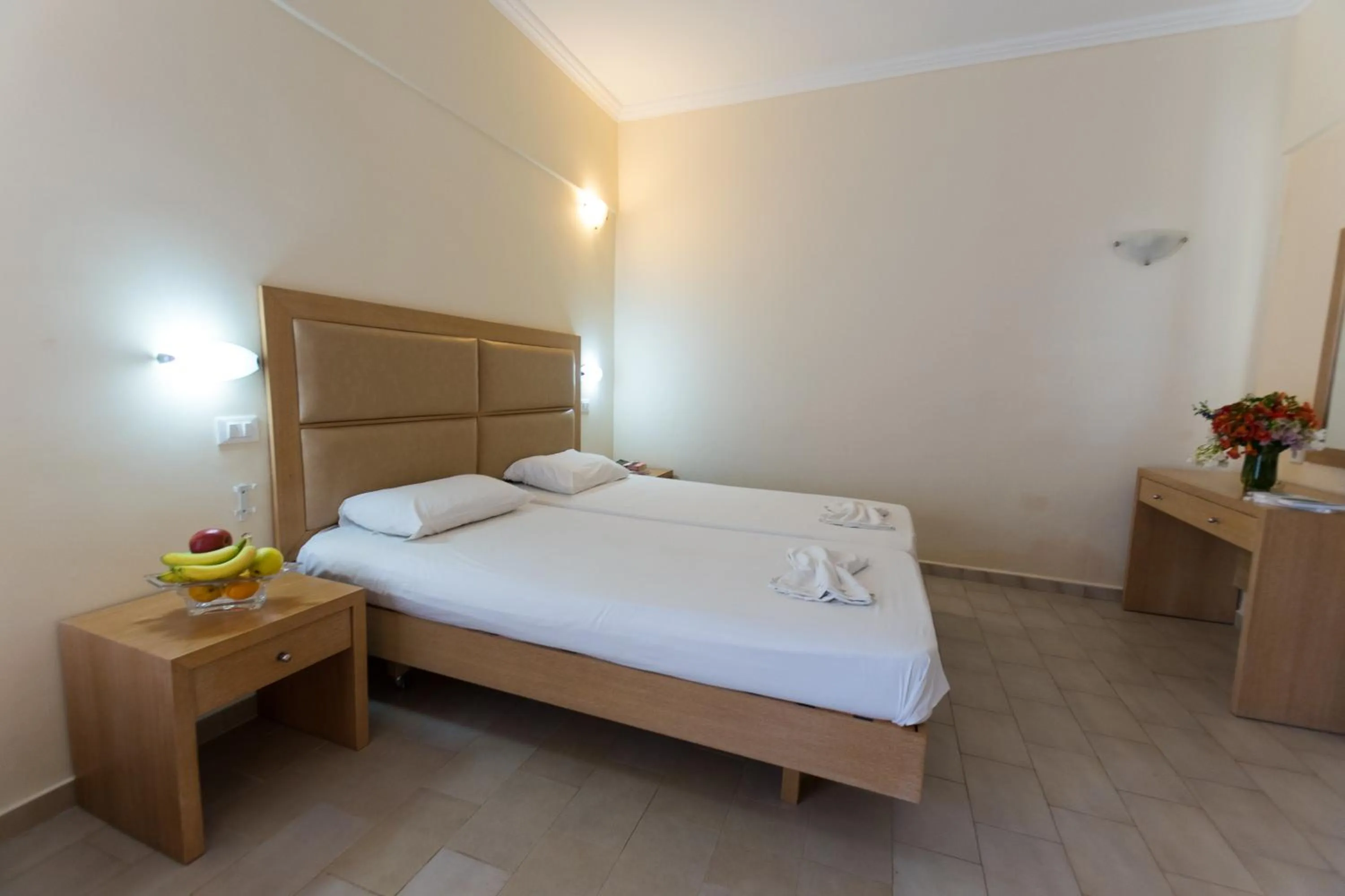 Bed in Amaryllis front beach hotel