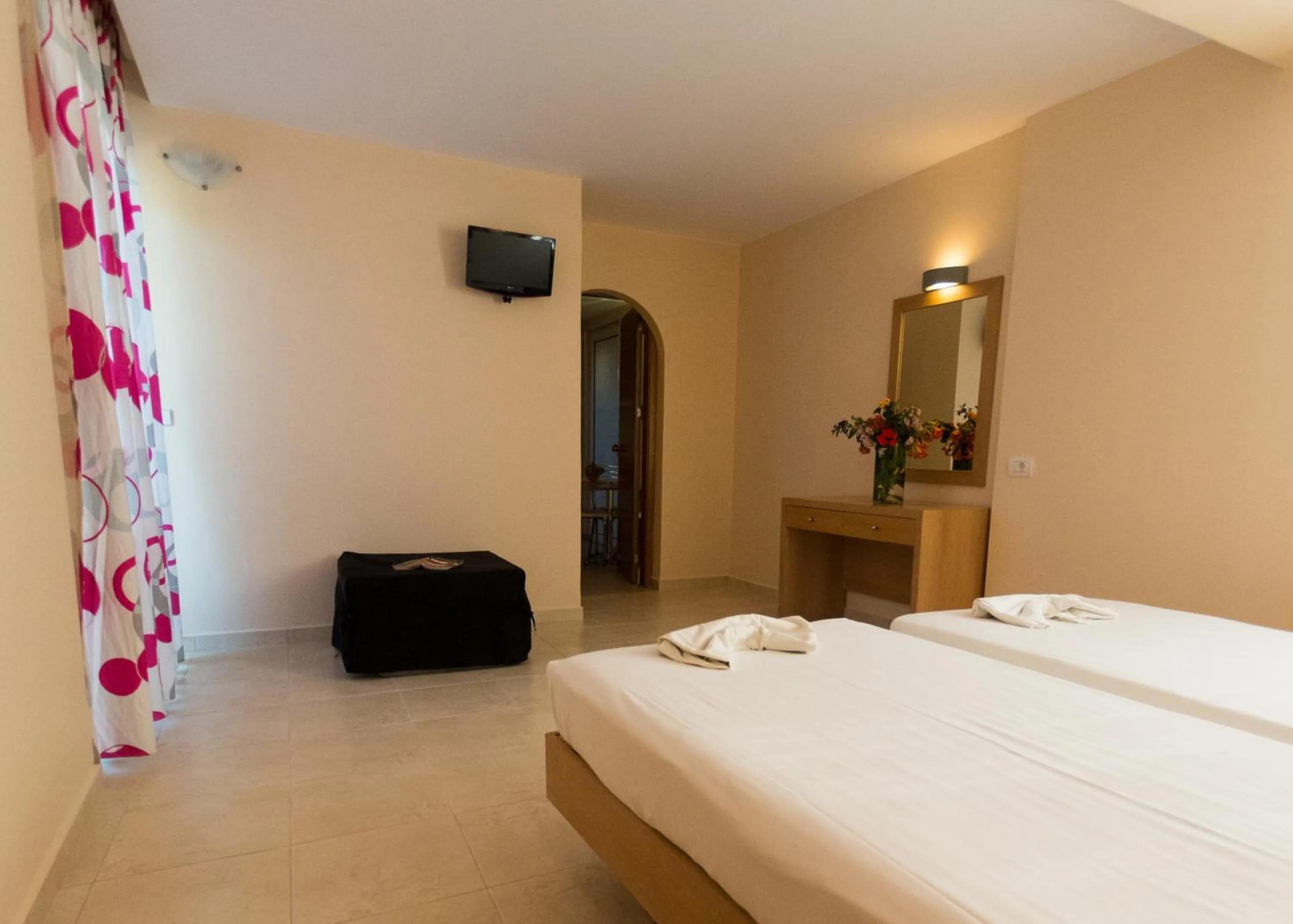 Photo of the whole room, Bed in Amaryllis front beach hotel