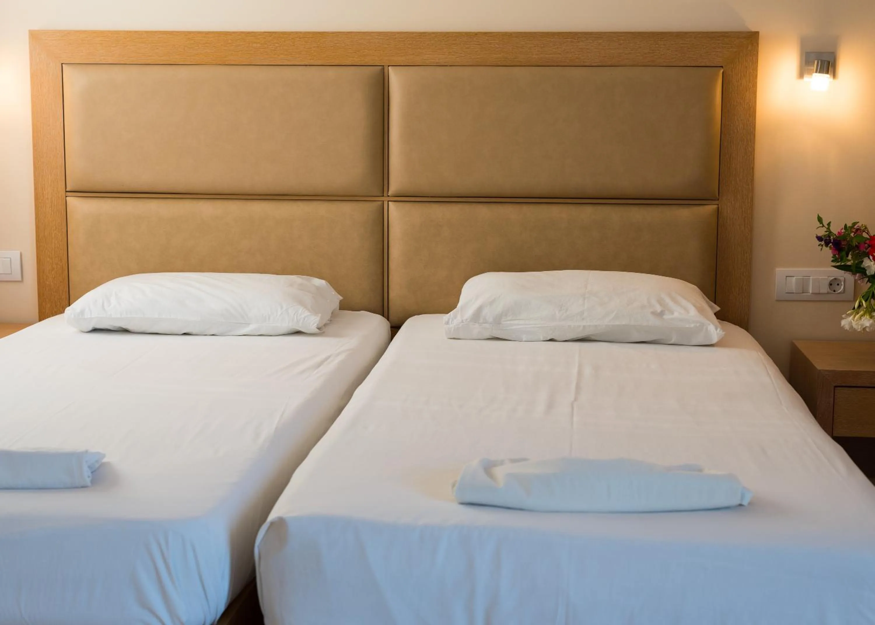 Bed in Amaryllis front beach hotel