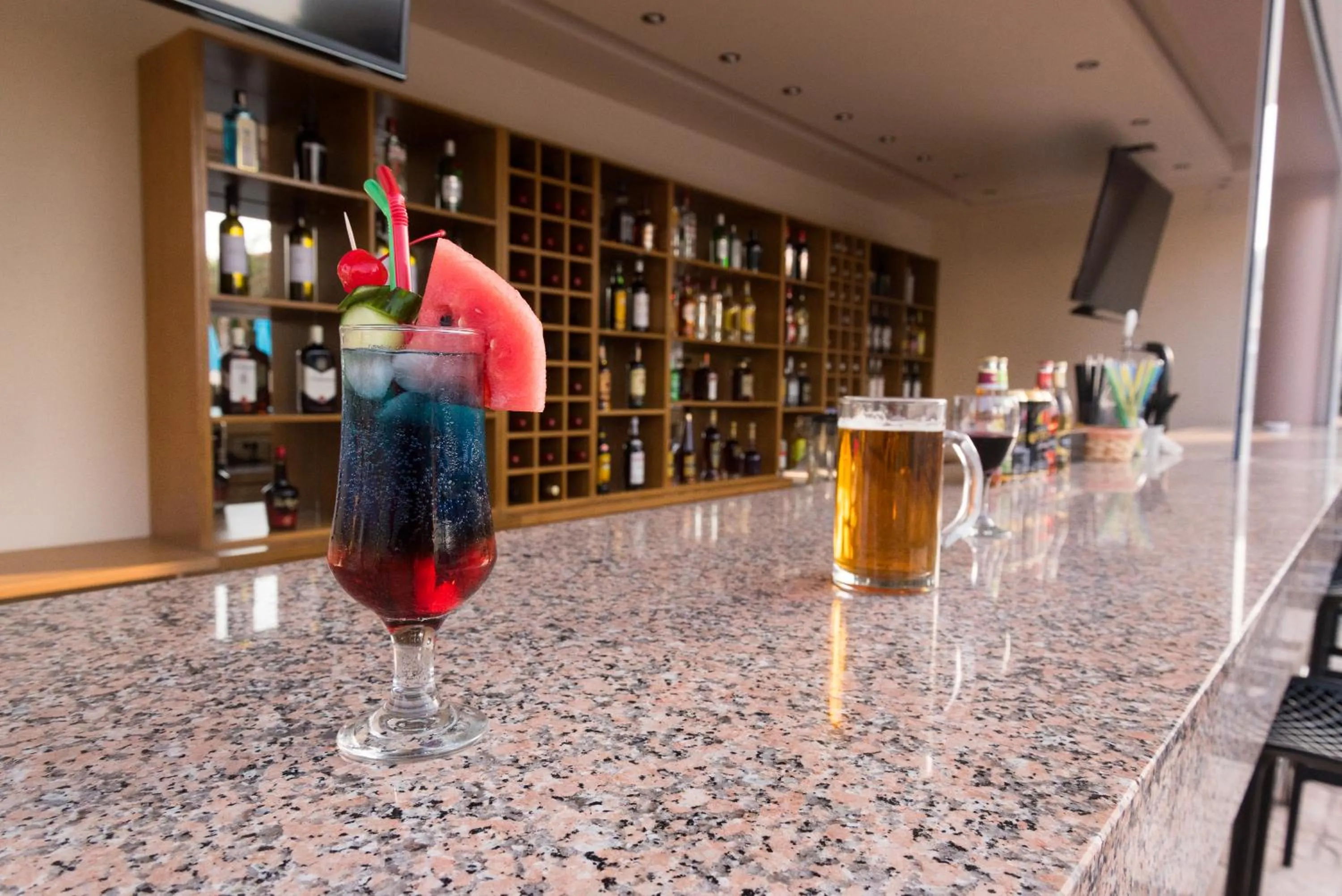 Lounge or bar in Amaryllis front beach hotel