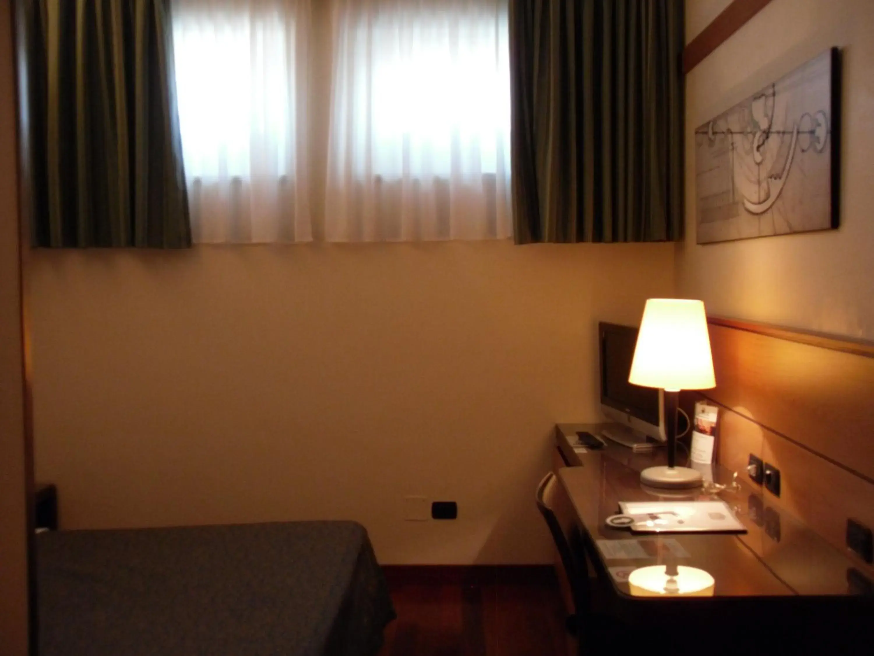 Decorative detail, Bed in Best Western Hotel Dei Cavalieri Decorative detail, Bed in Best Western Hotel Dei Cavalieri