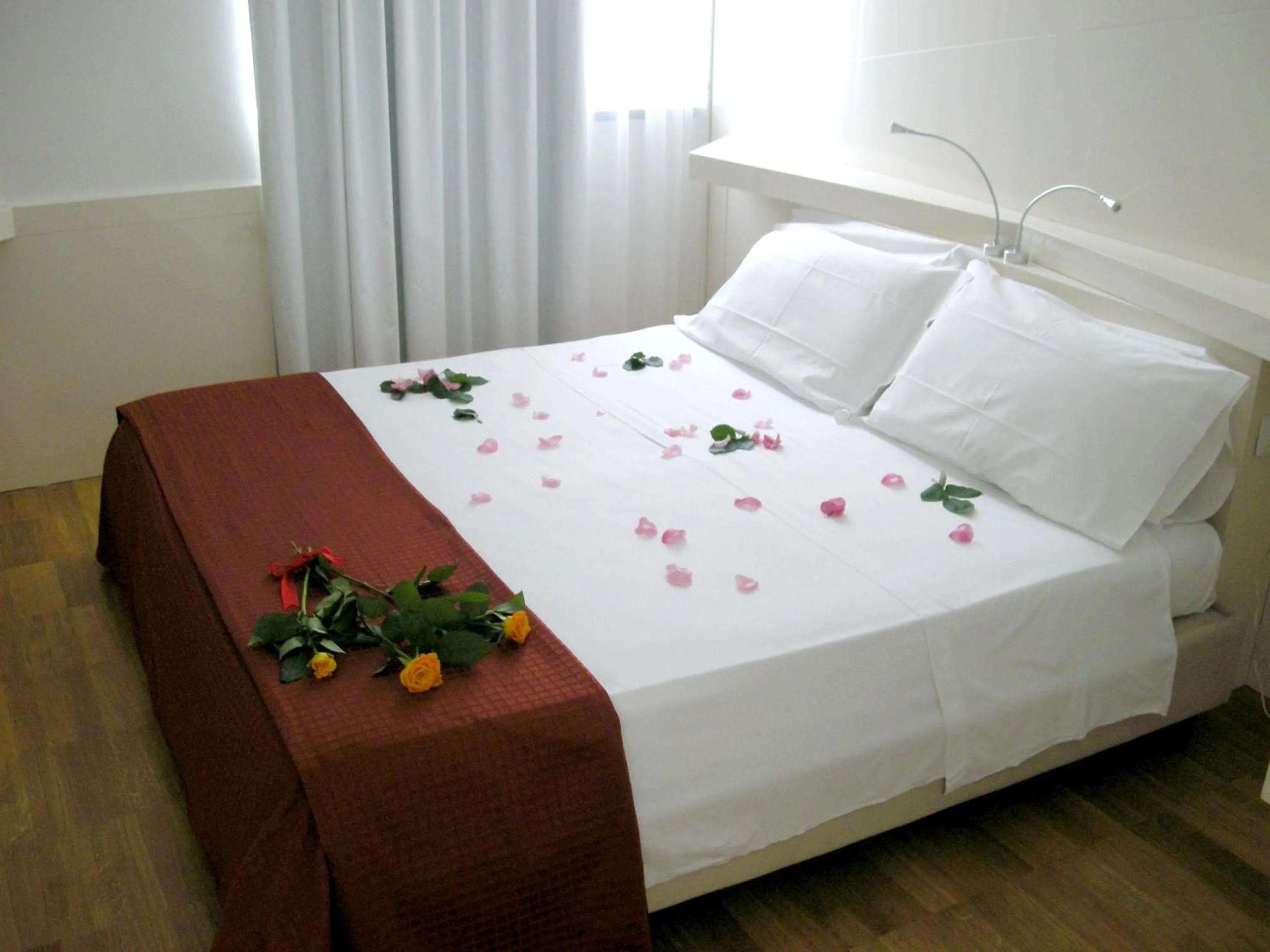 Bed in Hotel Excelsior