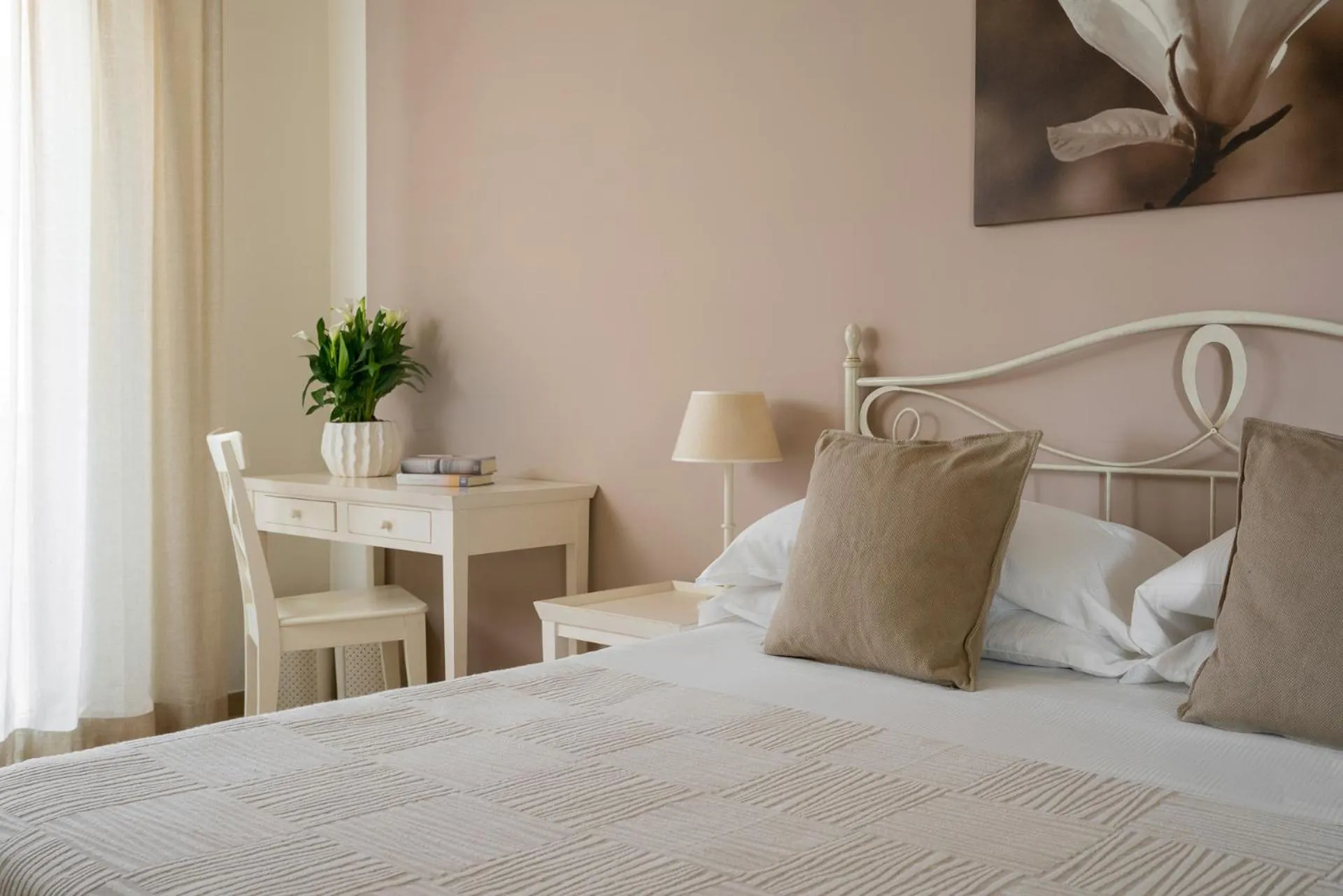 Bed in Hotel Giardino Suites&Spa