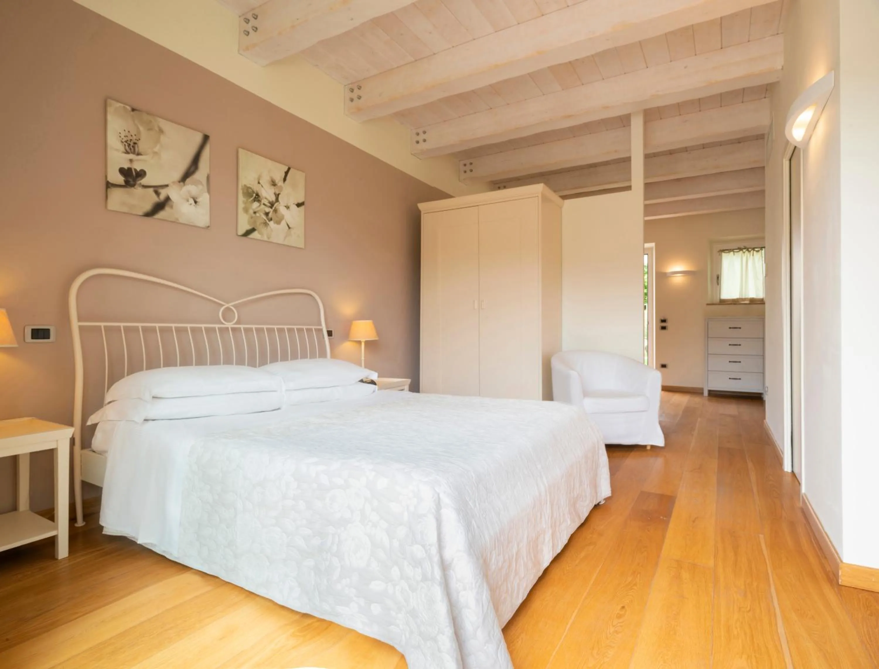 Bed in Hotel Giardino Suites&Spa