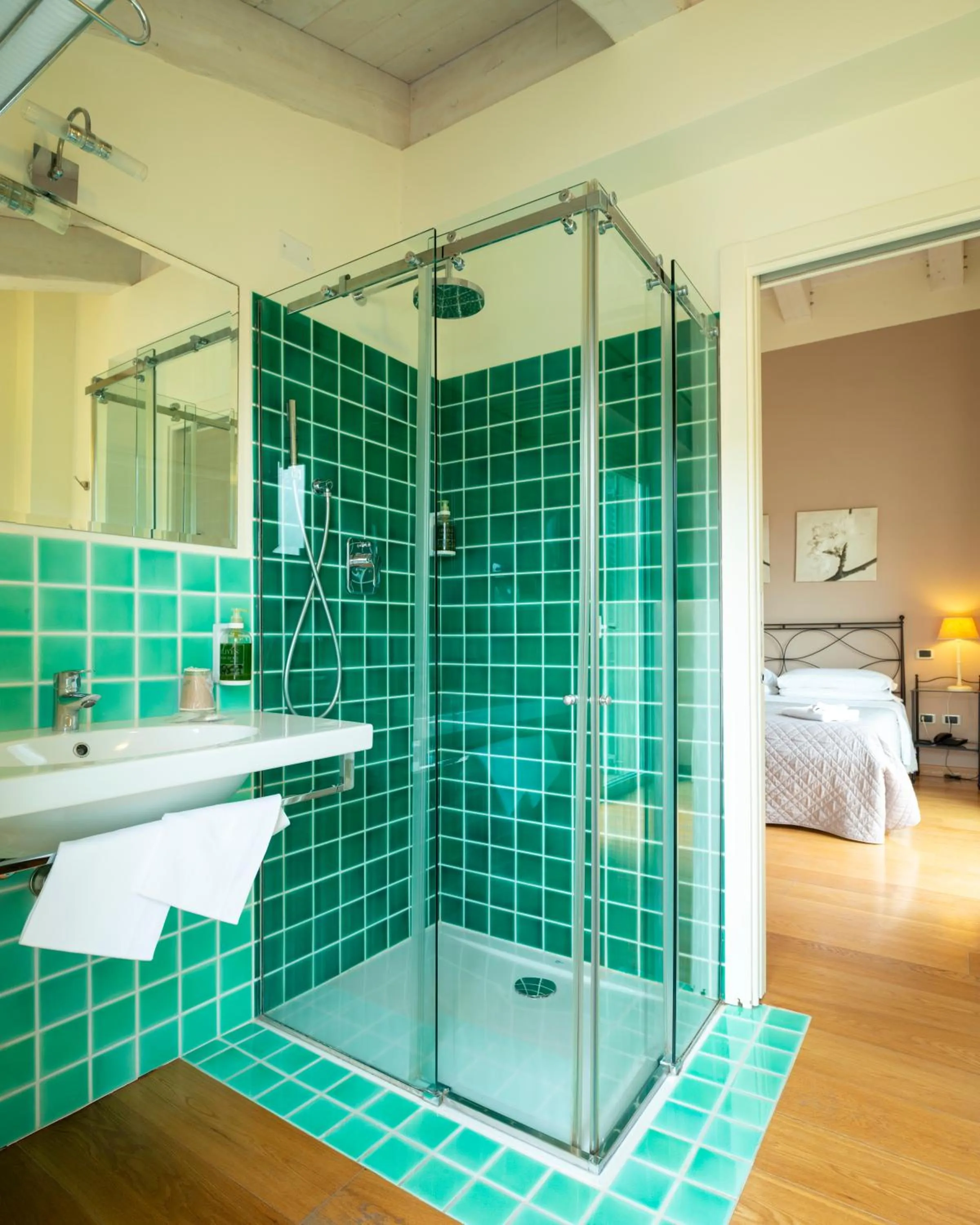 Bed in Hotel Giardino Suites&Spa