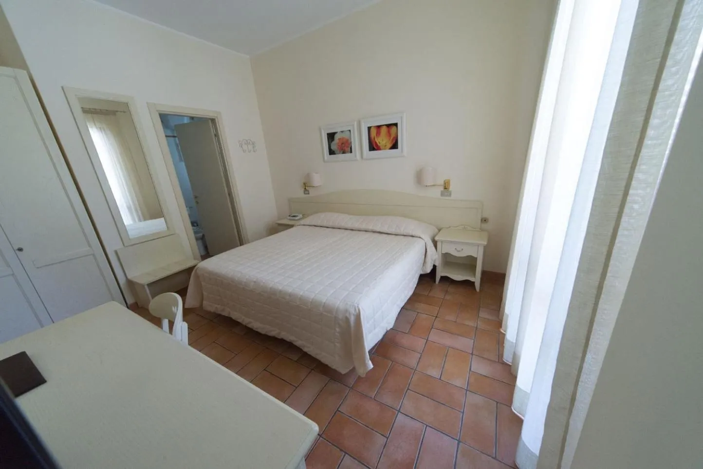 Bed in Hotel Giardino Suites&Spa