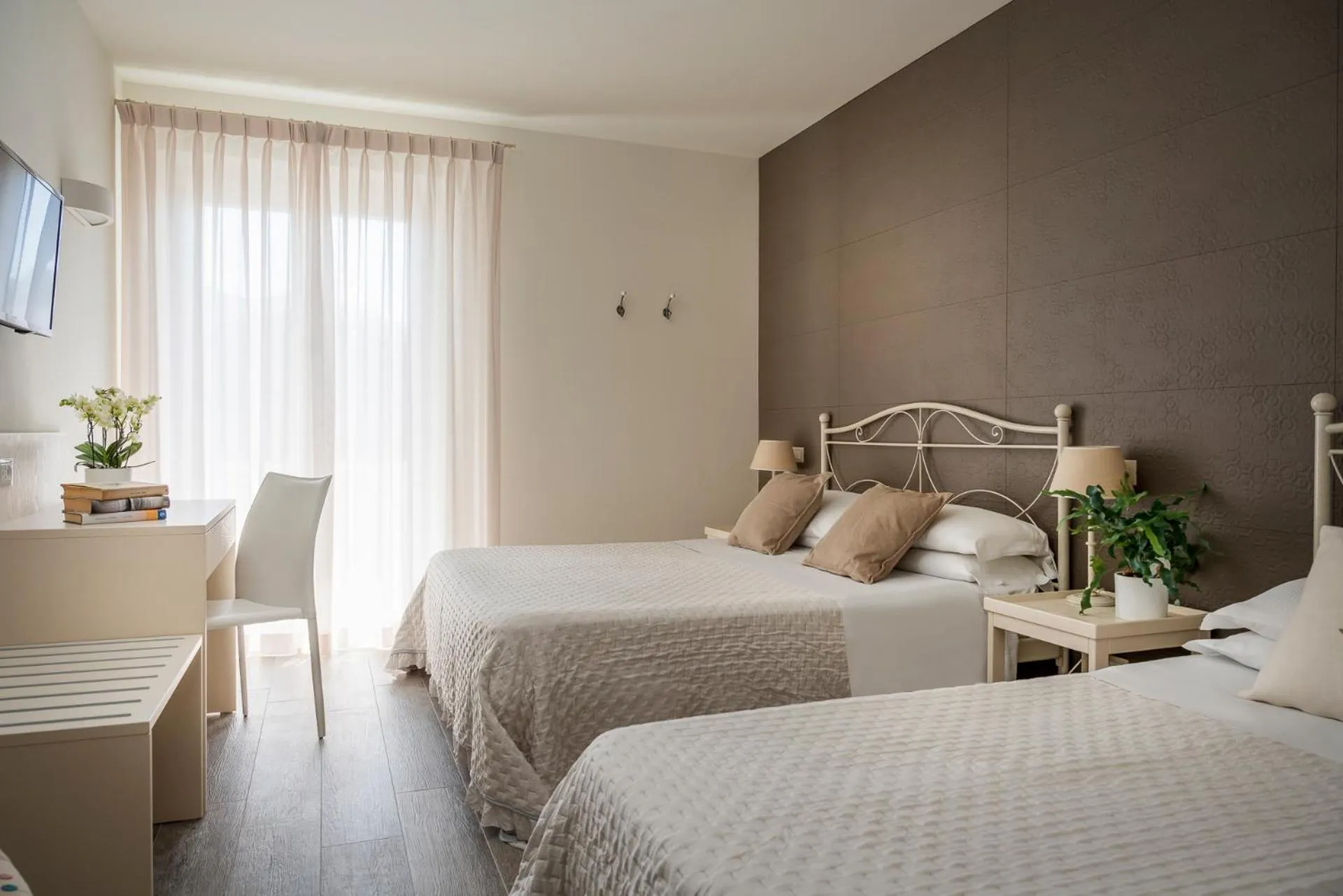 Bed in Hotel Giardino Suites&Spa