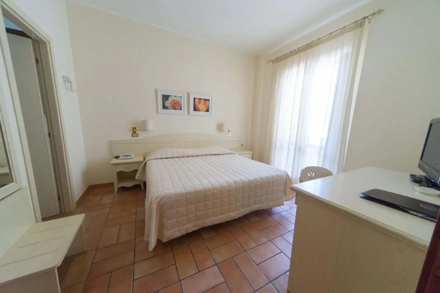 Bed in Hotel Giardino Suites&Spa