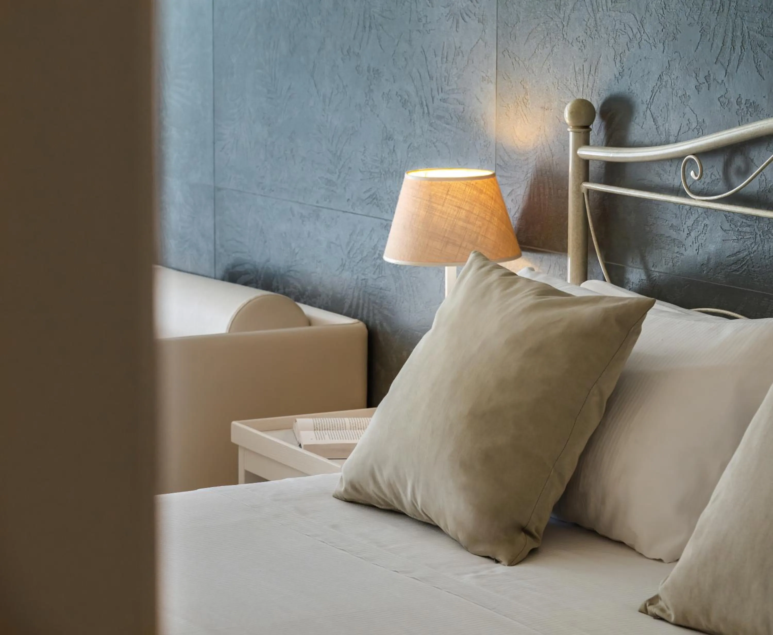 Bed in Hotel Giardino Suites&Spa