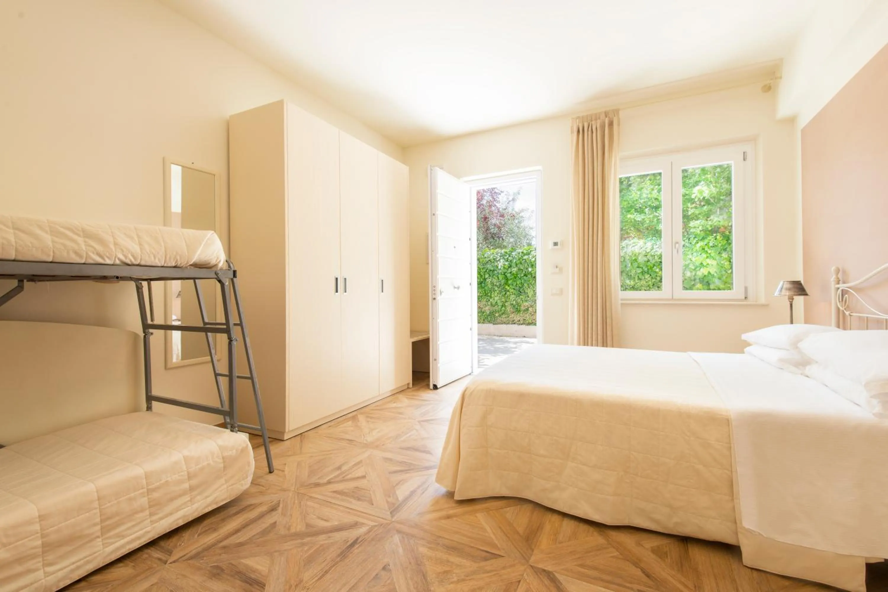 Bed in Hotel Giardino Suites&Spa