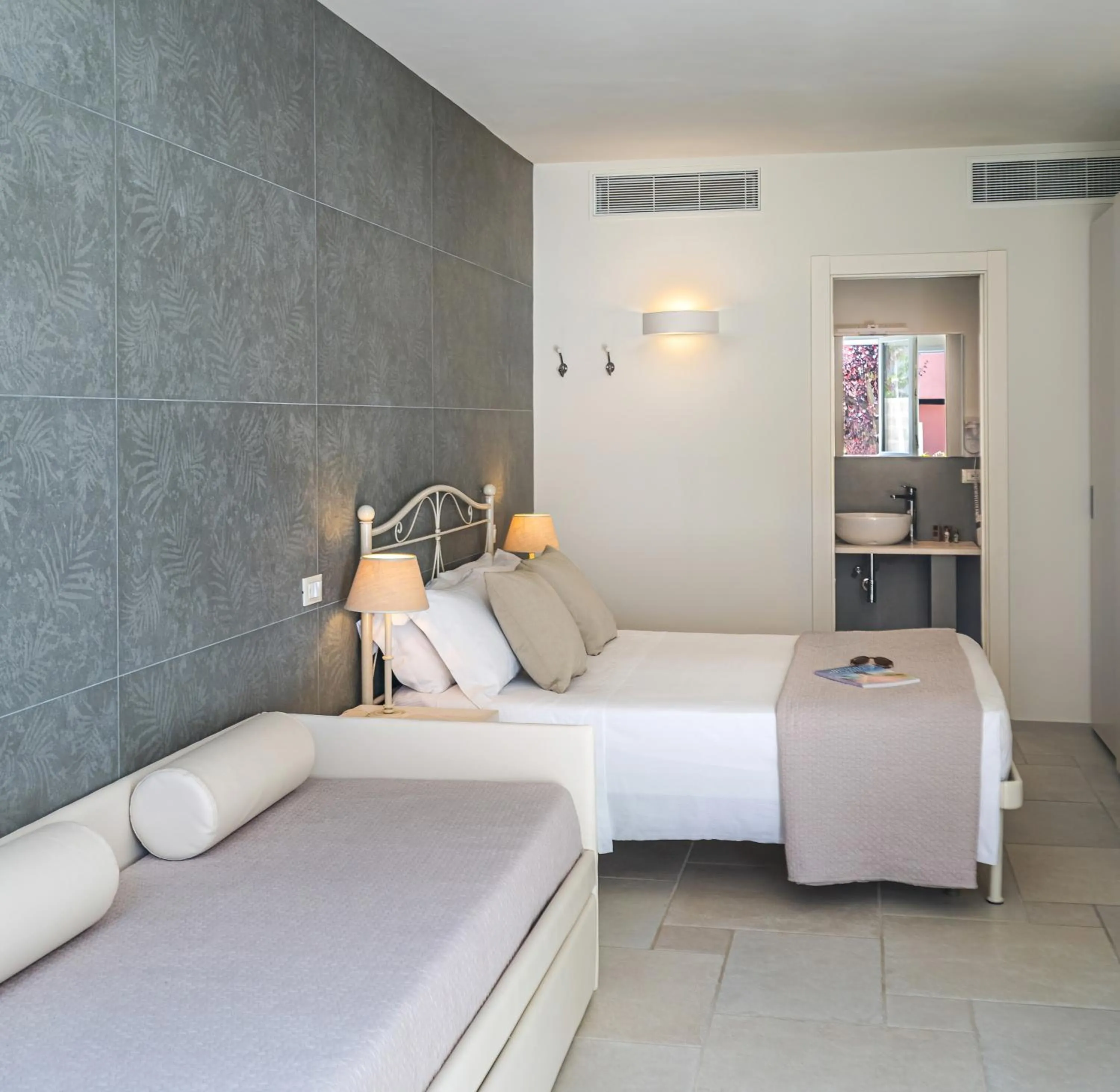 Bed in Hotel Giardino Suites&Spa