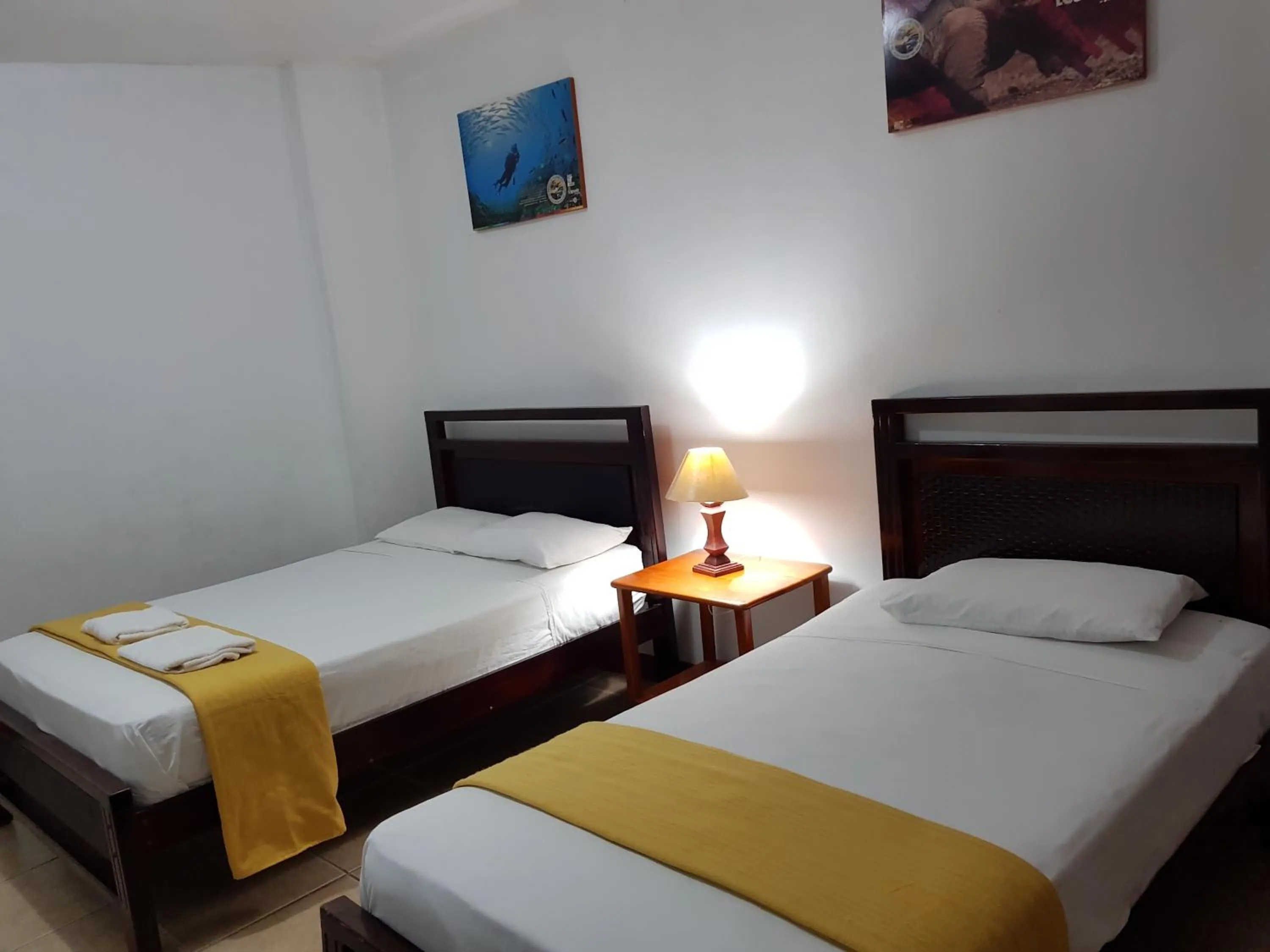 Bed in Gloria - Galápagos Inn