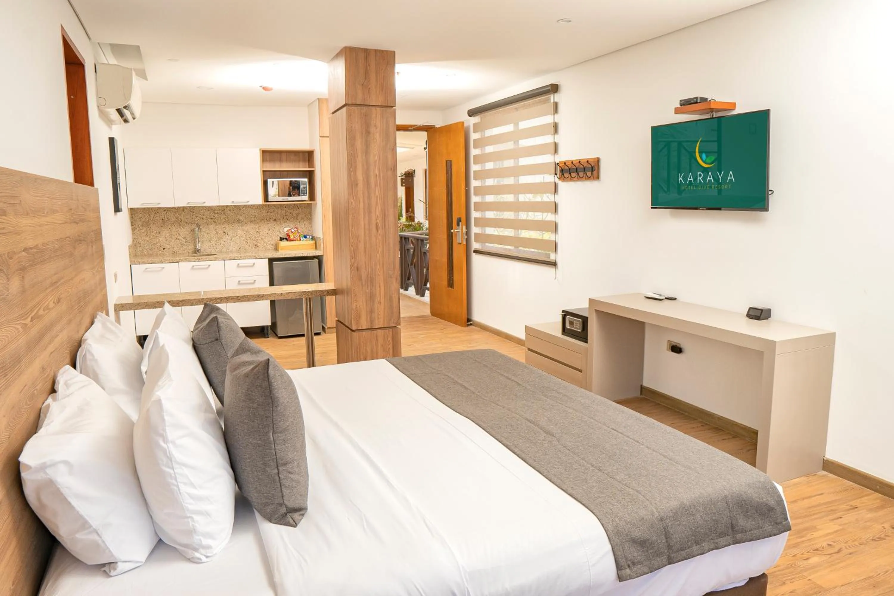 Bed in HOTEL KARAYA DIVE RESORT