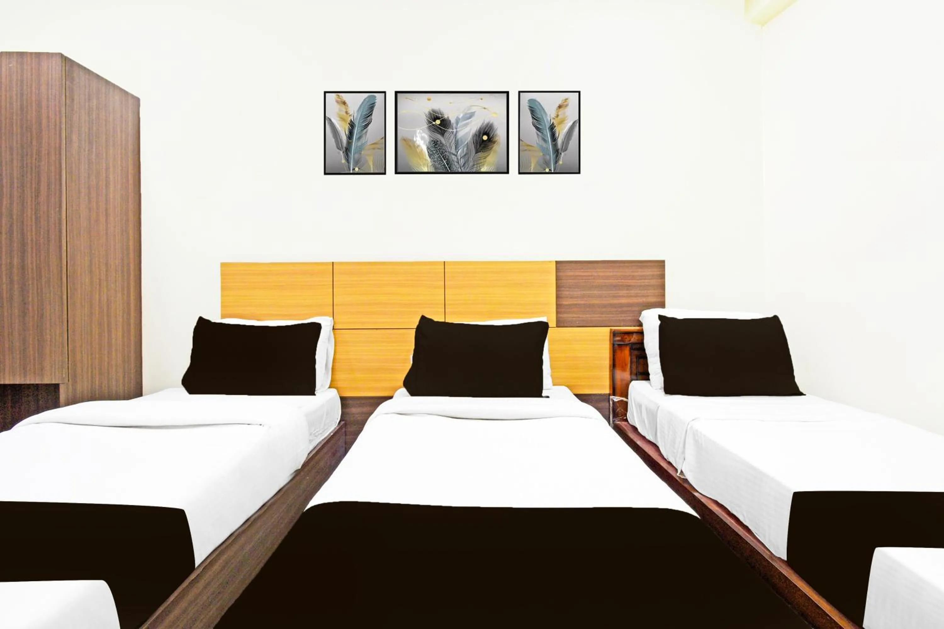 Bedroom, Bed in Super Townhouse Kondapur Near Botanical Garden Formerly RRR Inn