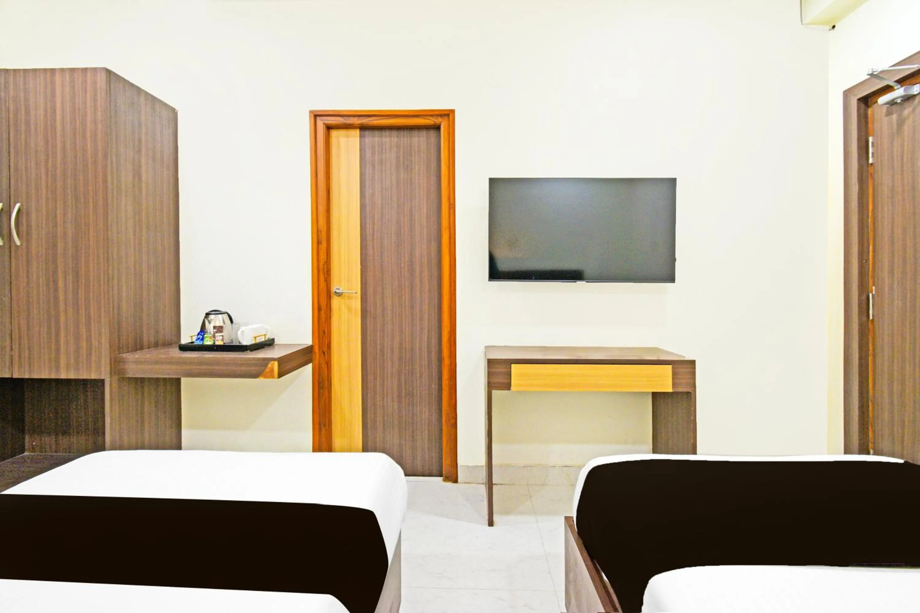 Bedroom, Bed in Super Townhouse Kondapur Near Botanical Garden Formerly RRR Inn