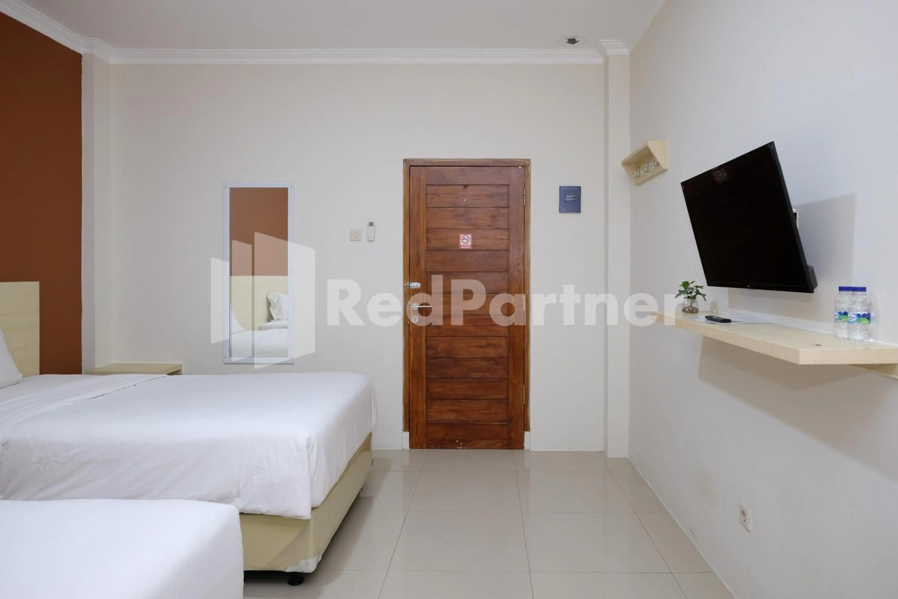 Bedroom, Bed in Hotel Andono near YIA Mitra RedDoorz