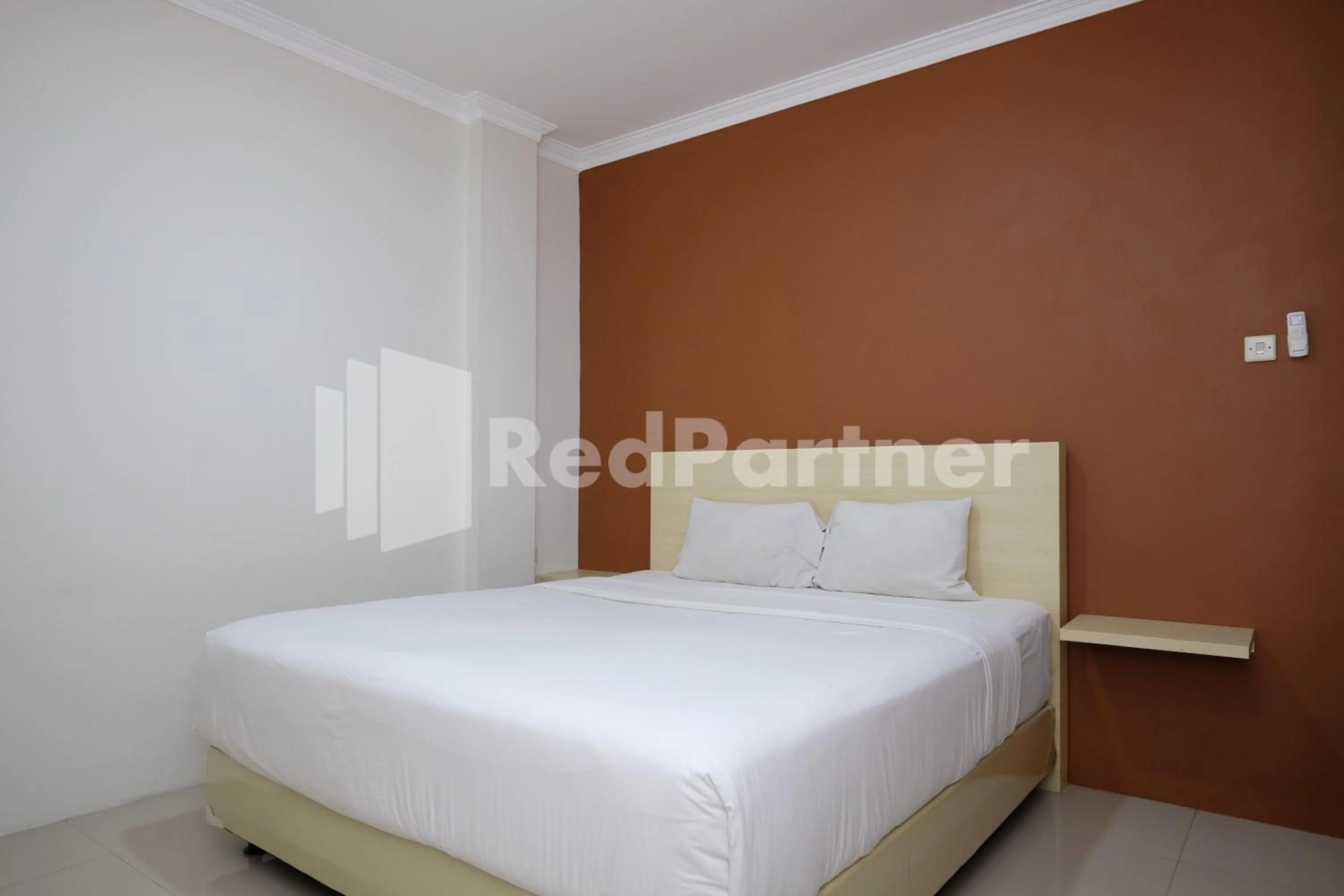 Bedroom, Bed in Hotel Andono near YIA Mitra RedDoorz