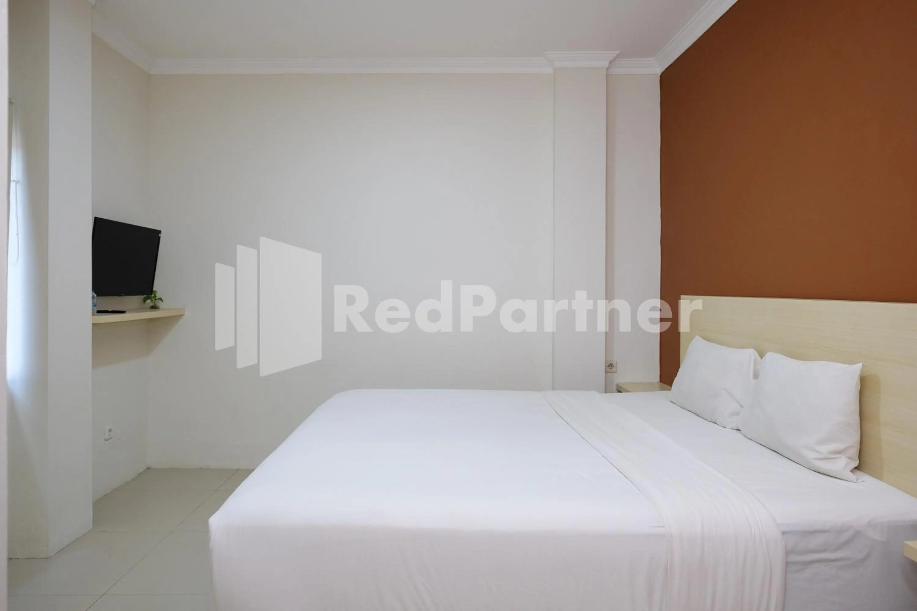 Bedroom, Bed in Hotel Andono near YIA Mitra RedDoorz