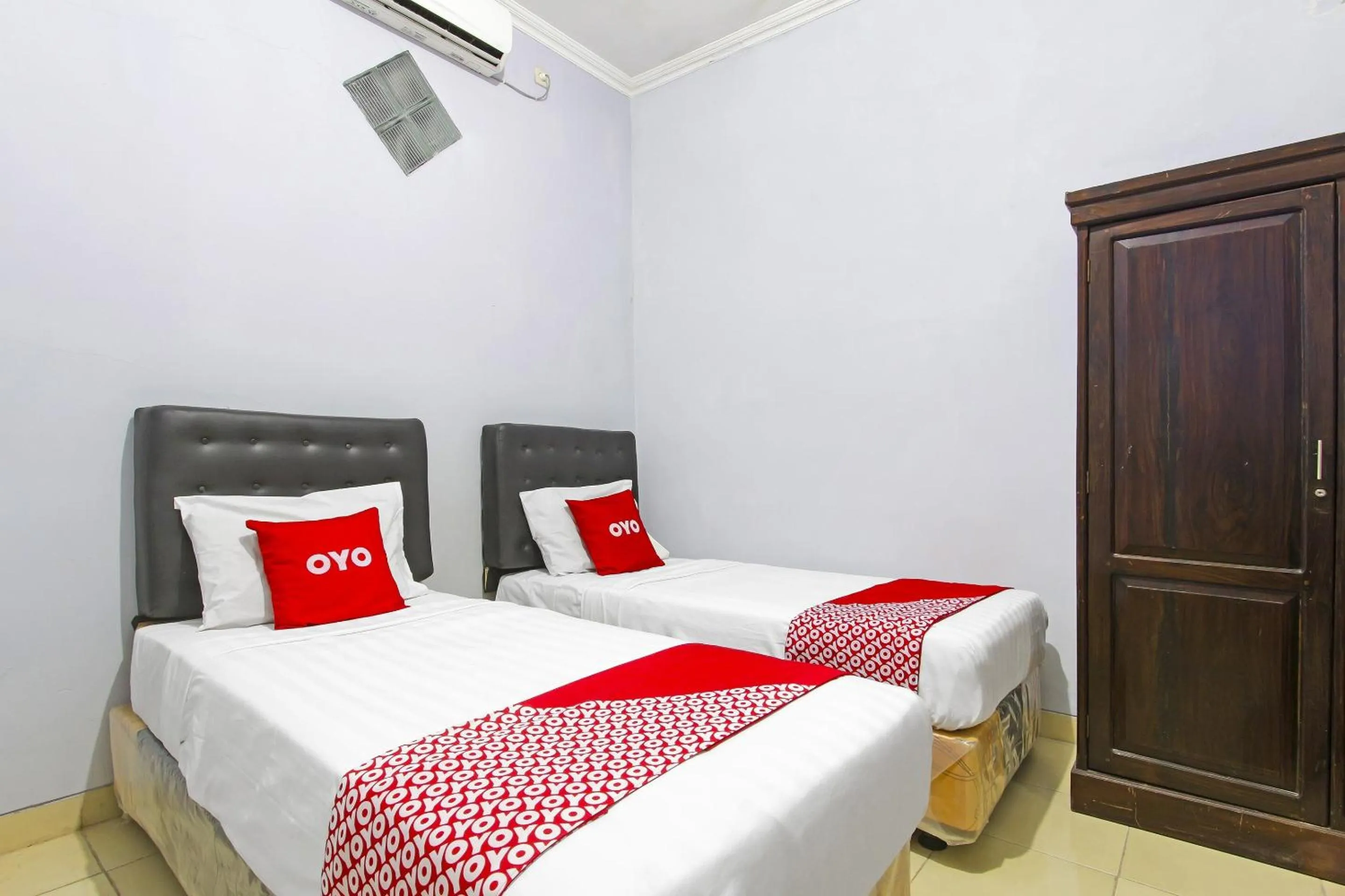 Bedroom, Bed in Hotel O Homestay Al Maidah