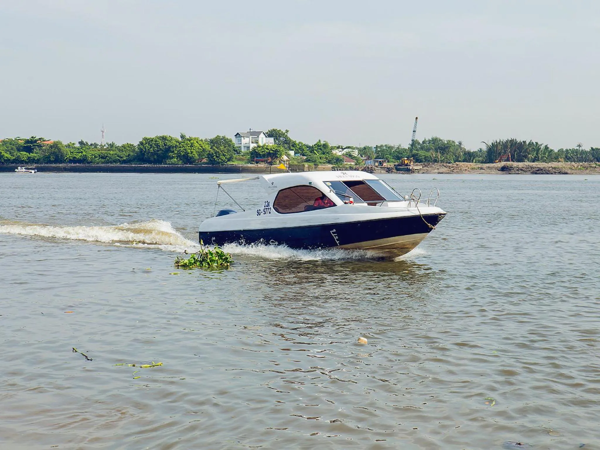 Canoeing in Villa Song Saigon