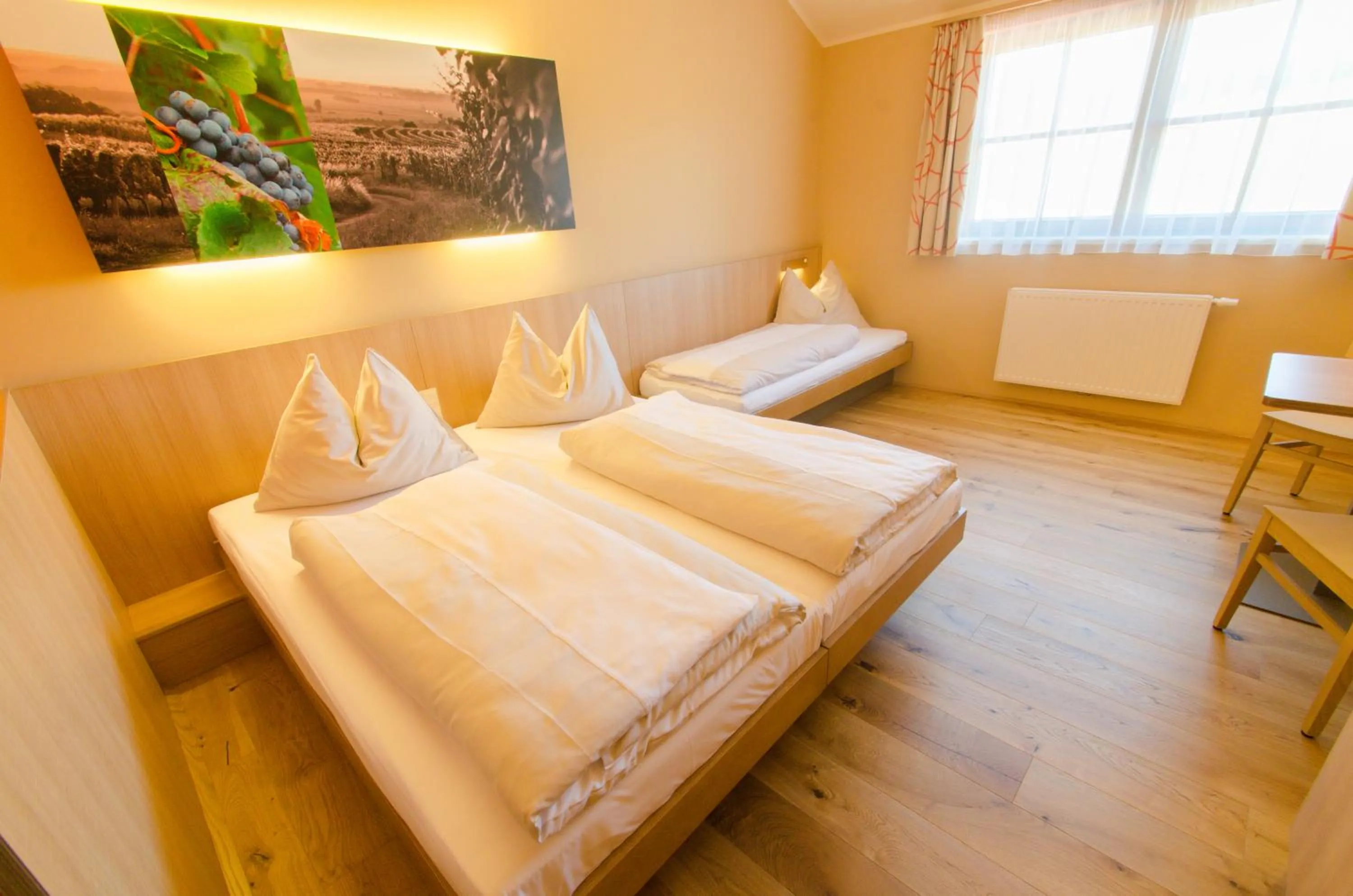 Photo of the whole room, Bed in JUFA Hotel Neutal