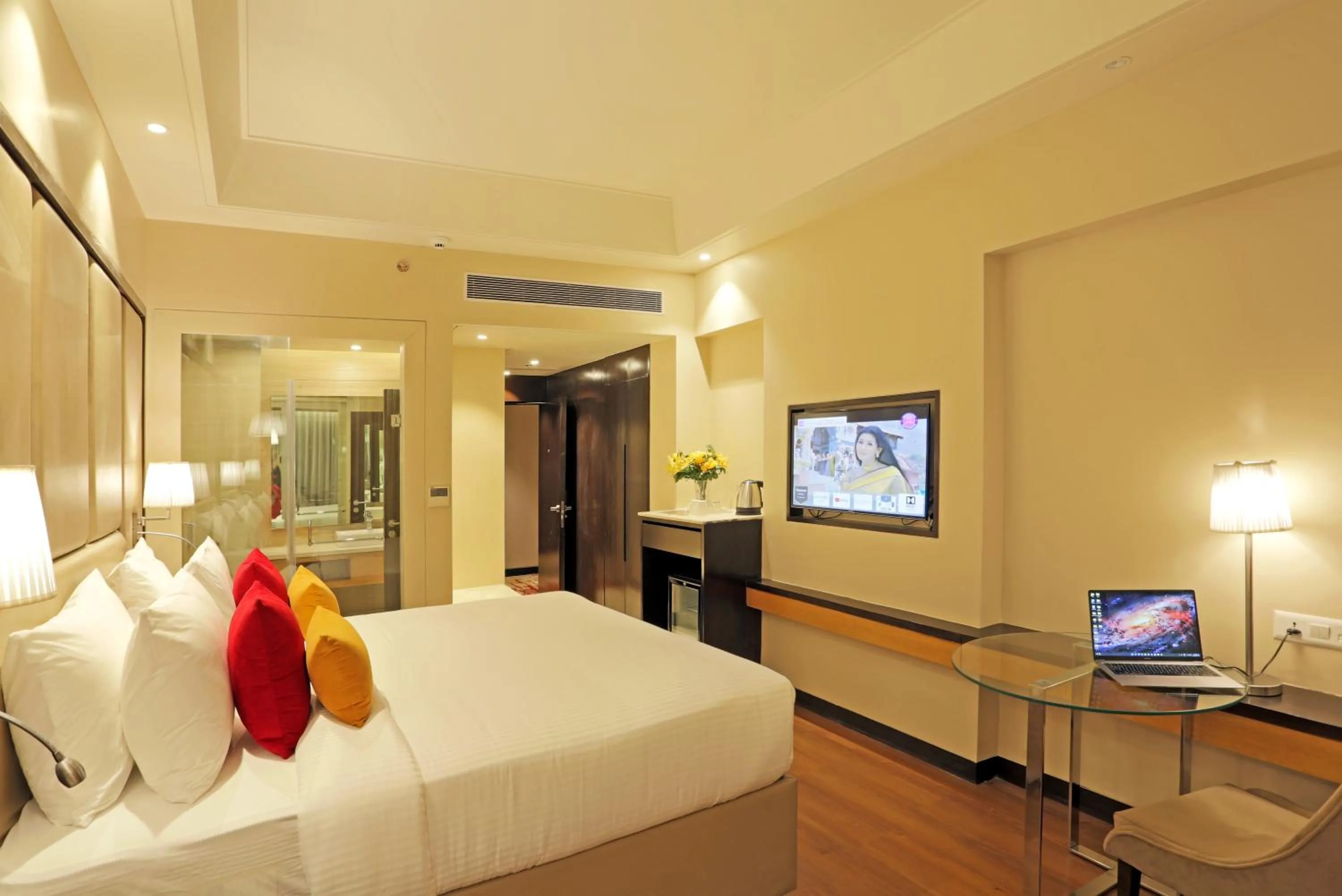 Photo of the whole room, Bed in The Vaishnodevi Sarovar Portico