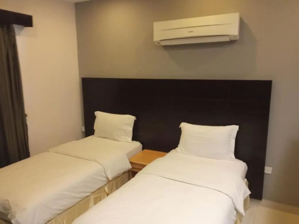 Bed in Asfar Hotel Apartments