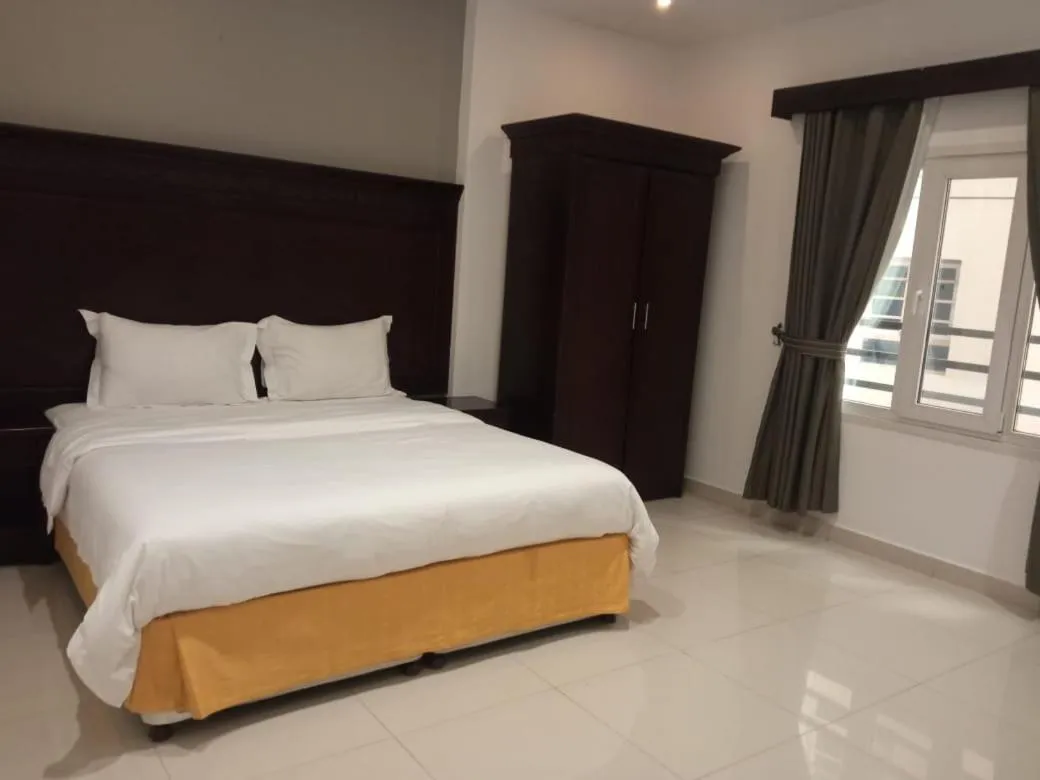 Bed in Asfar Hotel Apartments