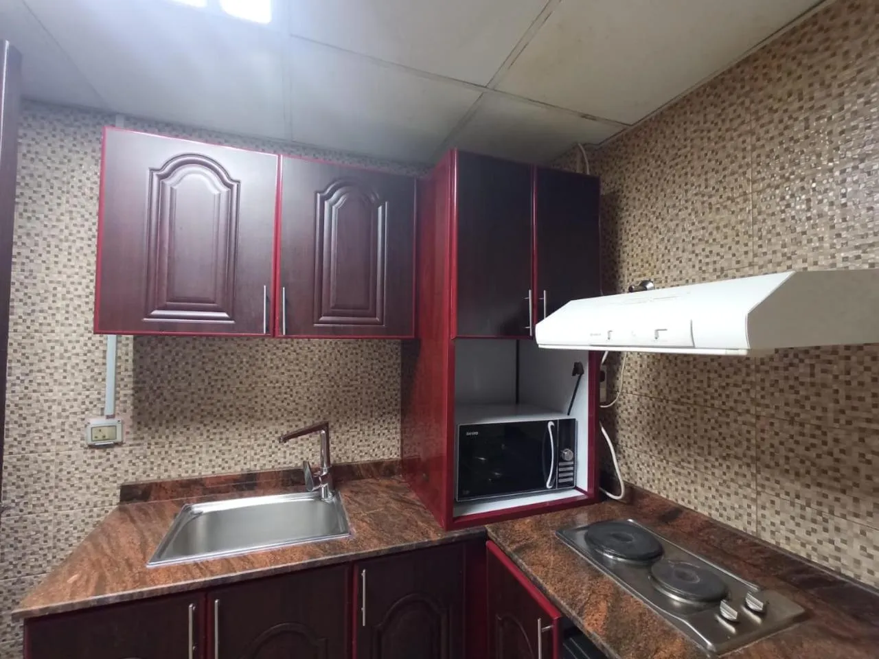 Kitchen or kitchenette in Asfar Hotel Apartments