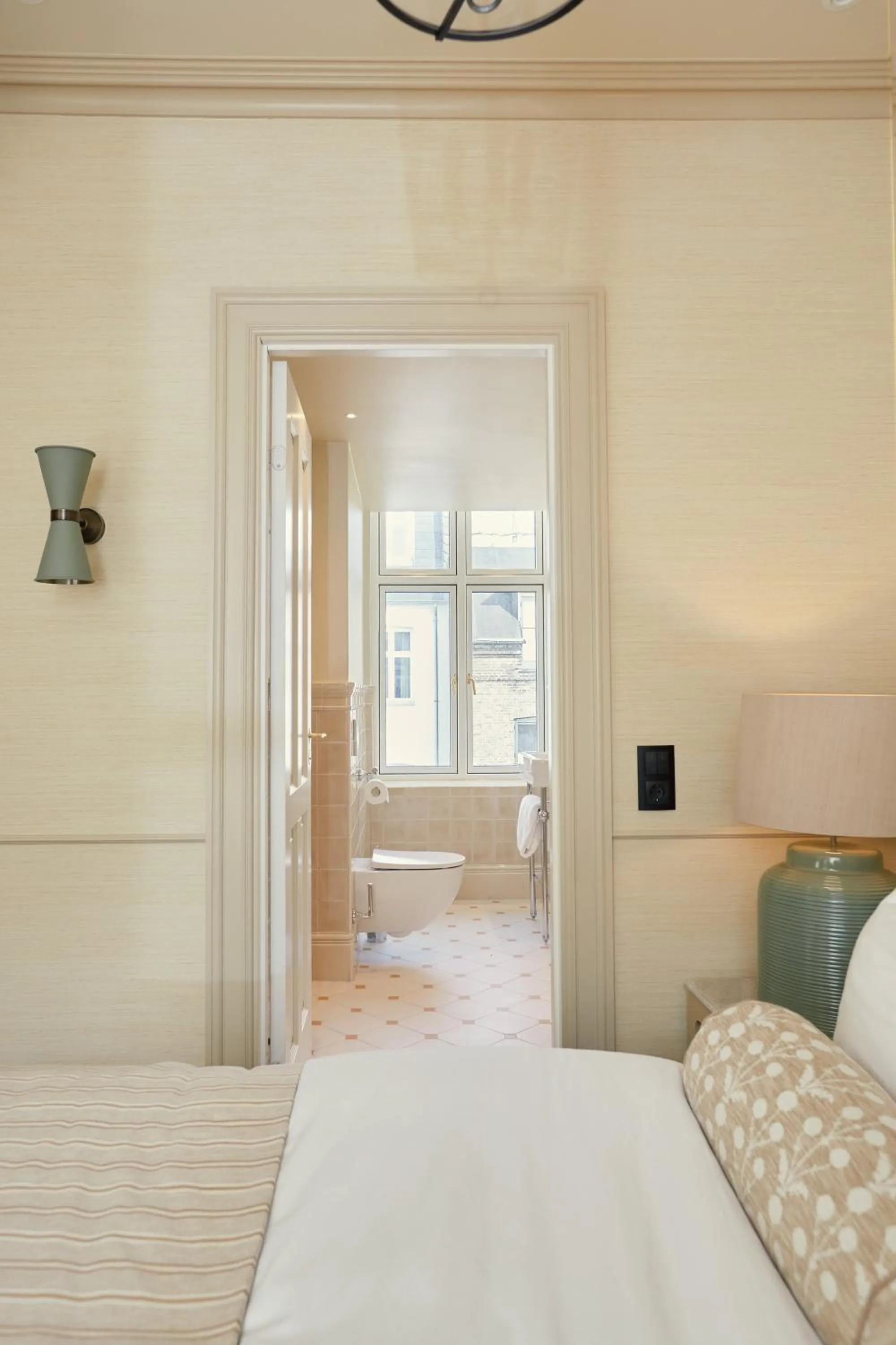 Bed in Henriks Hotel