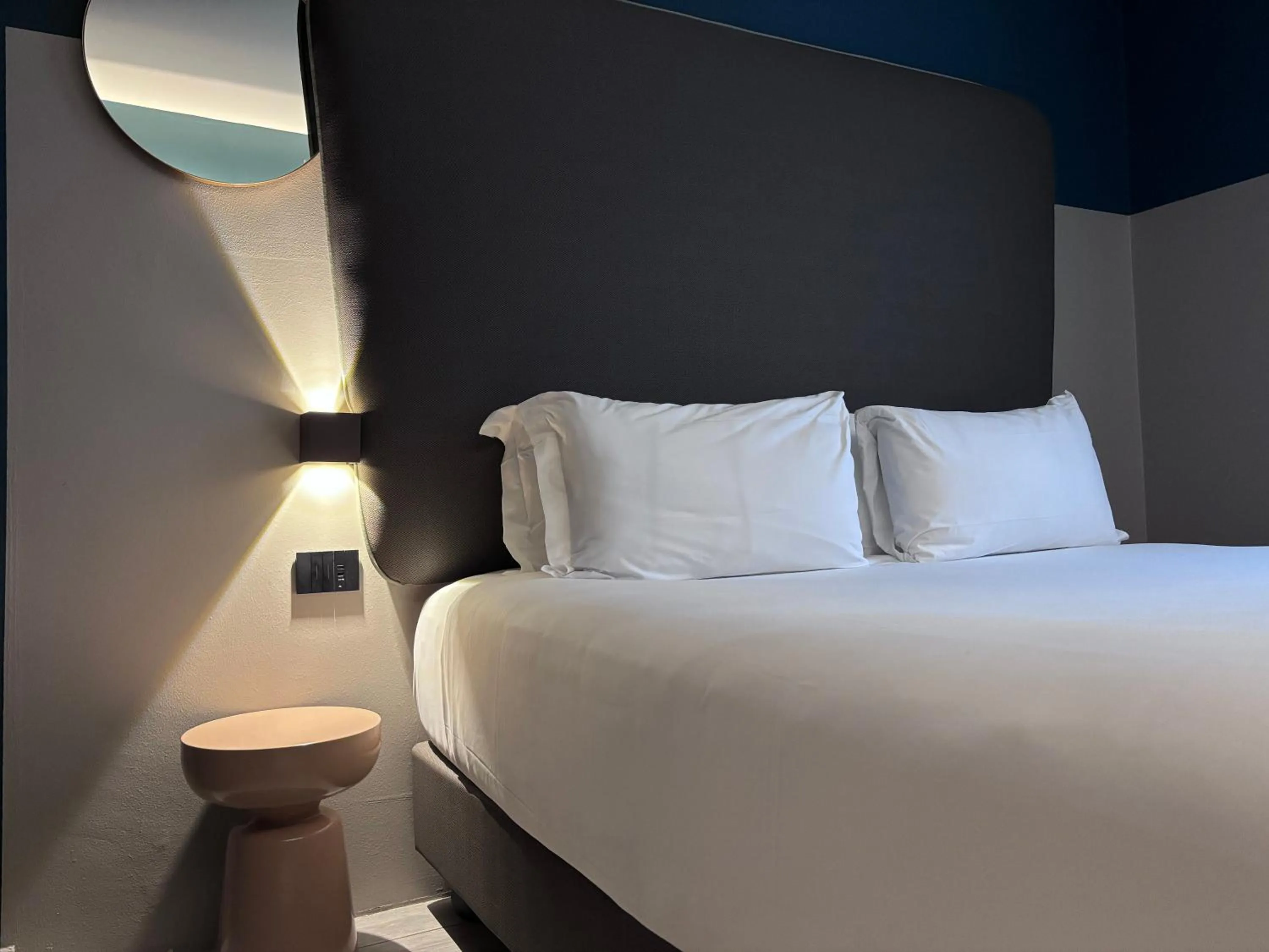 Bed in AV Hotel Milano