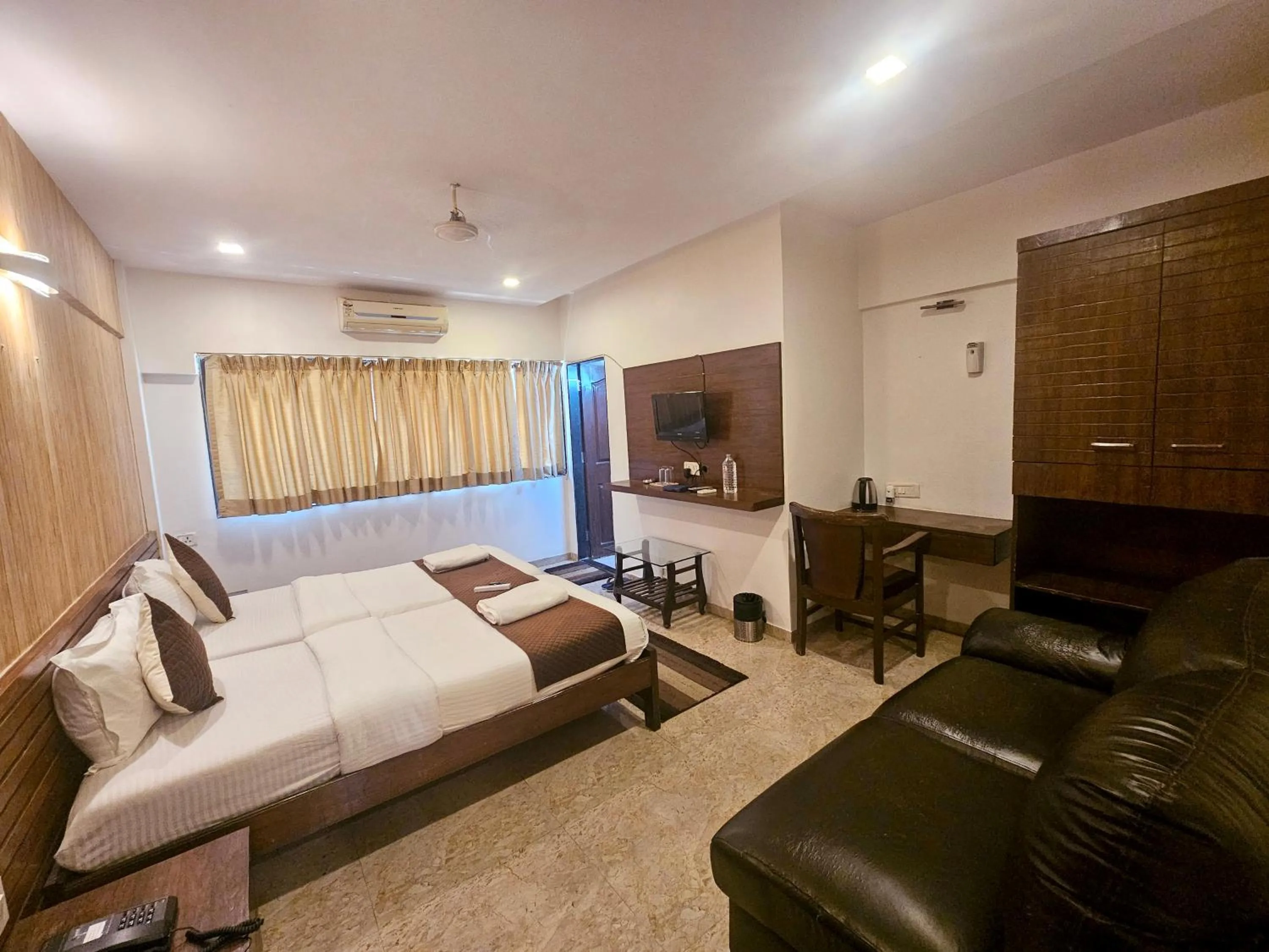 Photo of the whole room, Bed in Astha Residency