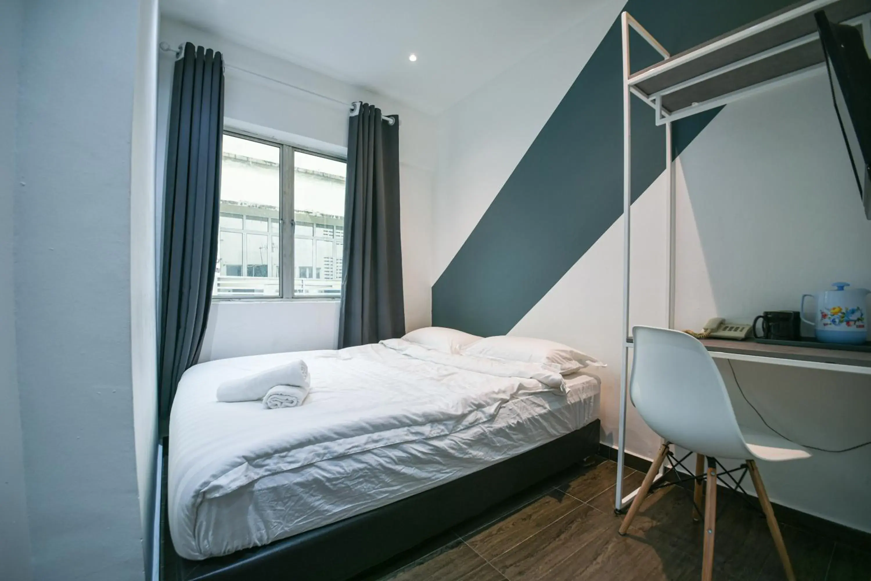 Bed in Meta Hotel Bed in Meta Hotel