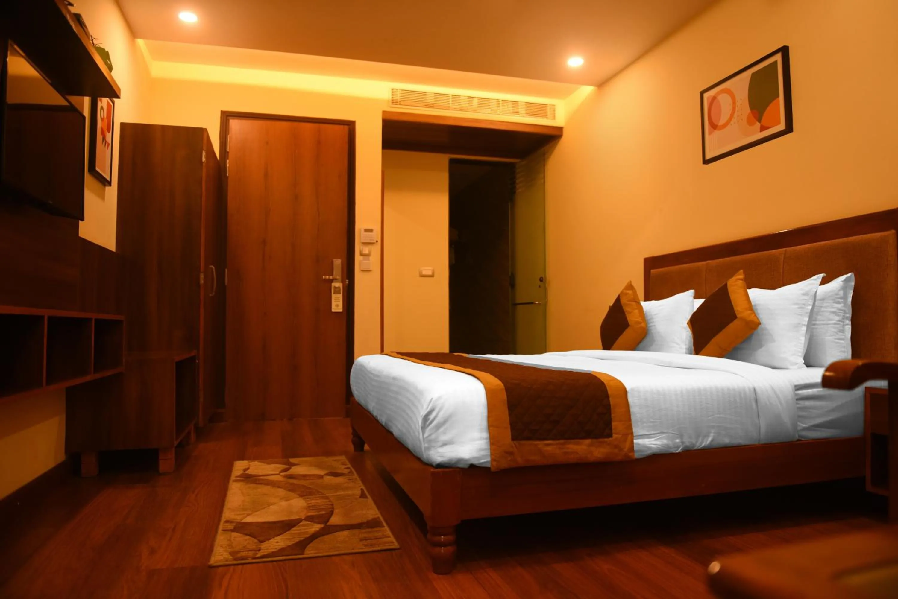 Photo of the whole room, Bed in The Abhyudyam Ganga
