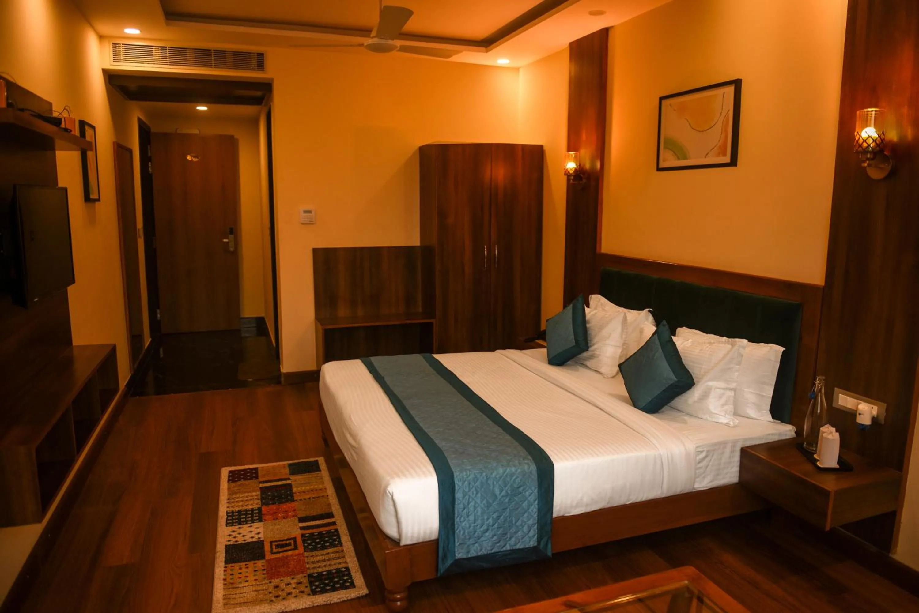Photo of the whole room, Bed in The Abhyudyam Ganga