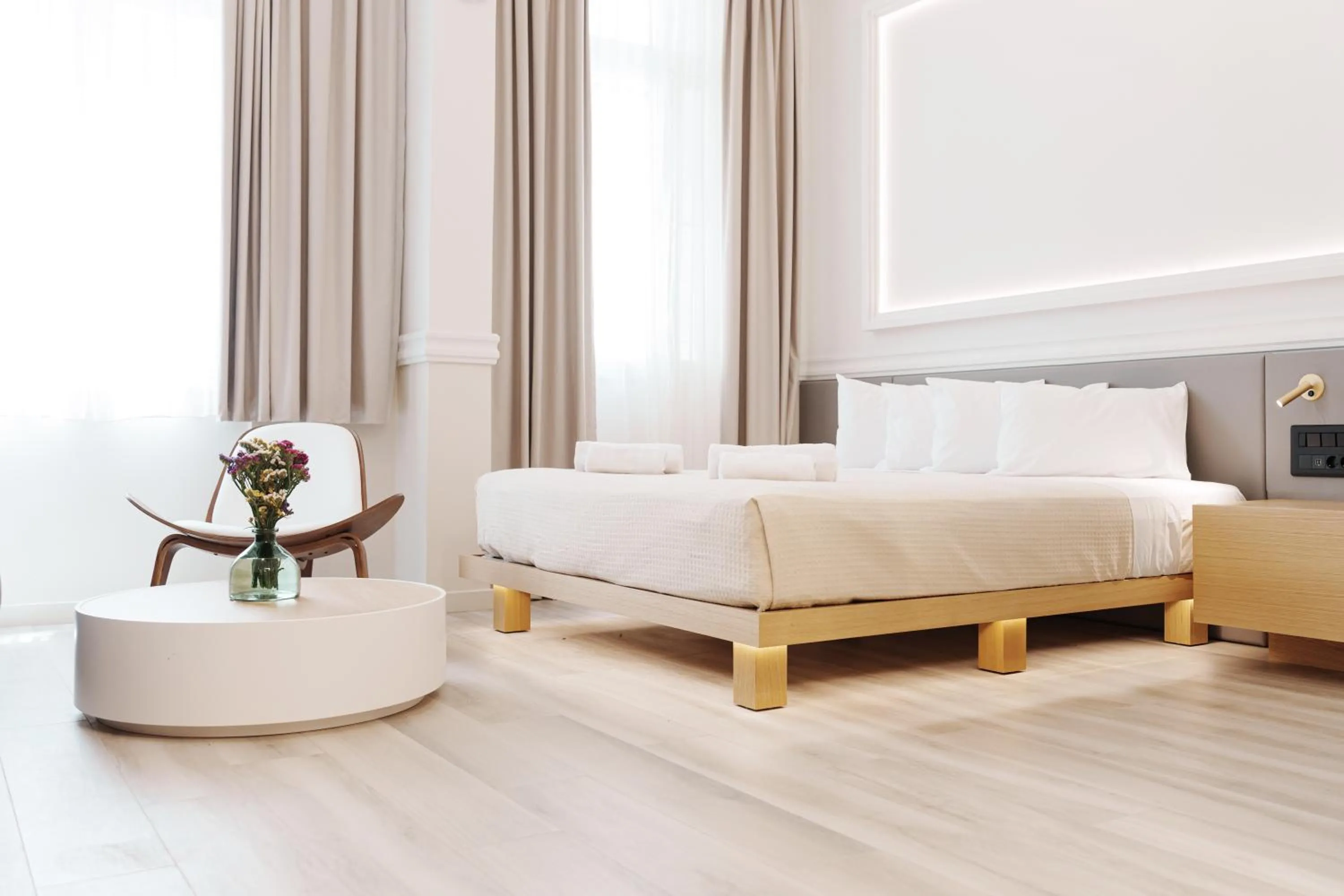 Bed in Agora Athens Suites