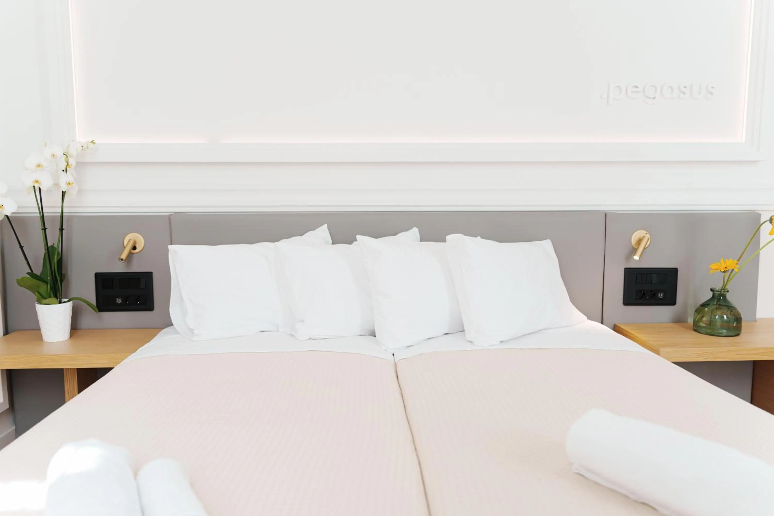 Bed in Agora Athens Suites