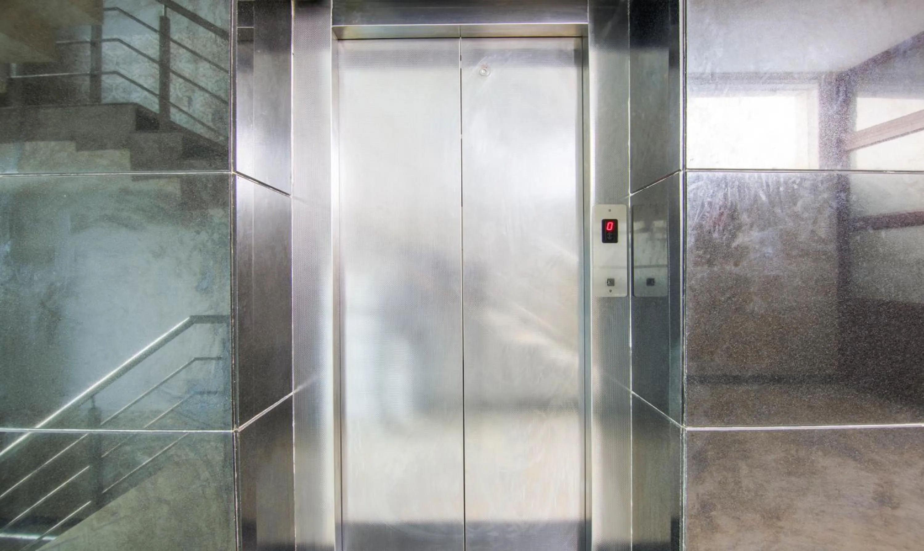 elevator in Treebo Trinetar International