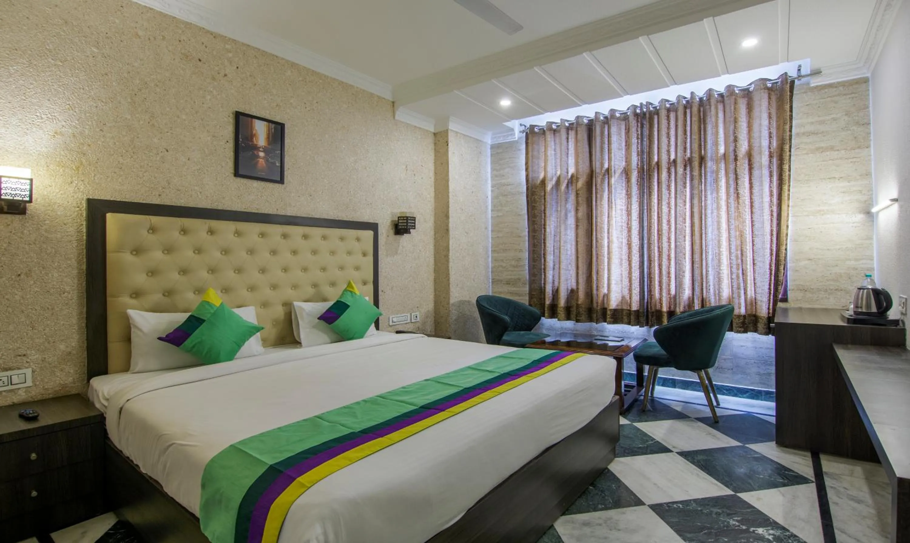 Bed in Treebo Trinetar International