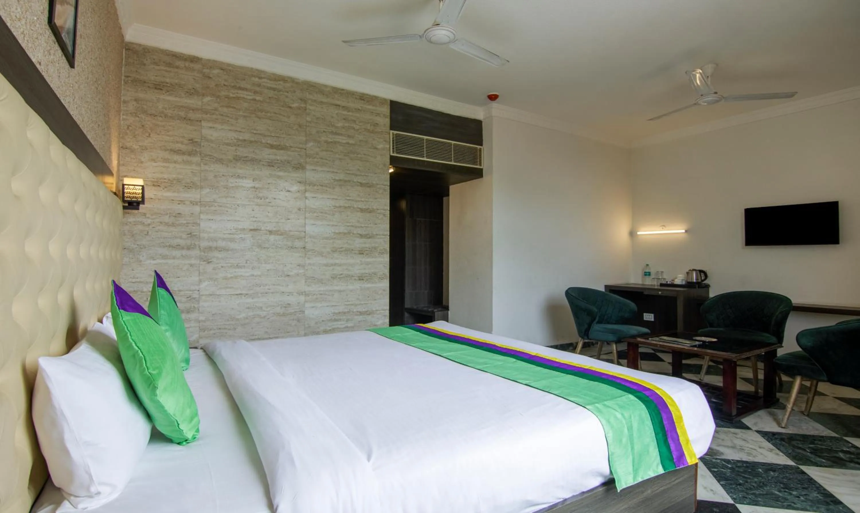 Bed in Treebo Trinetar International