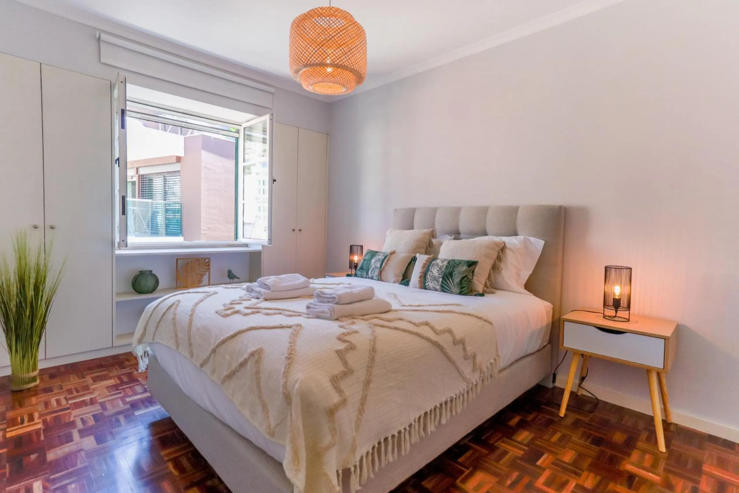 Bed in MIO Apartment by Homie
