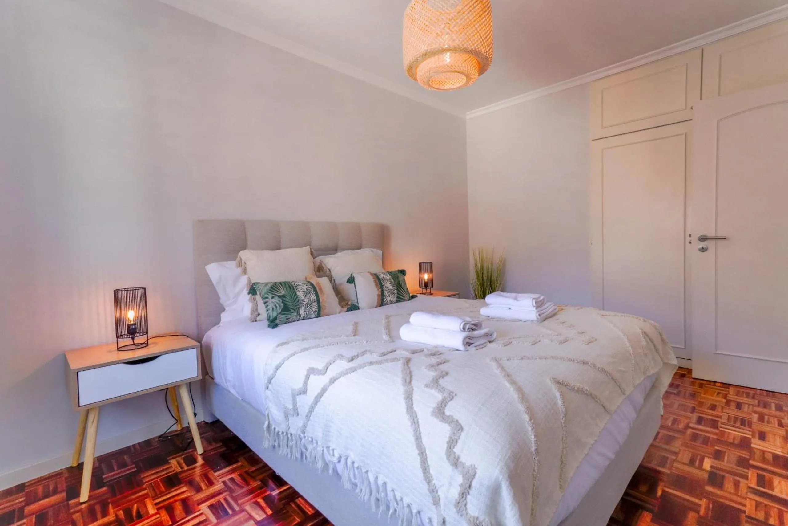 Bed in MIO Apartment by Homie