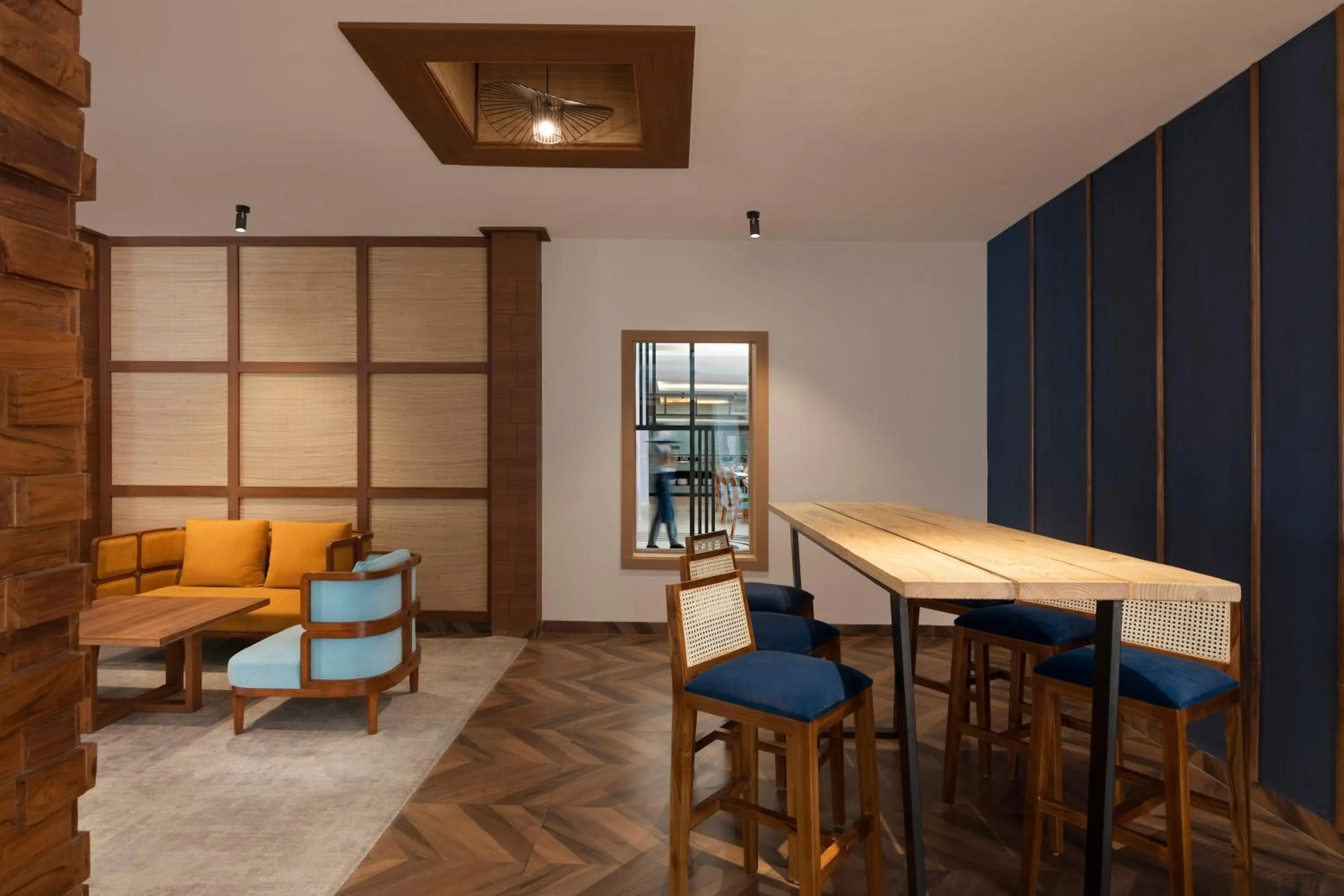 Communal lounge/ TV room in voco Jim Corbett by IHG