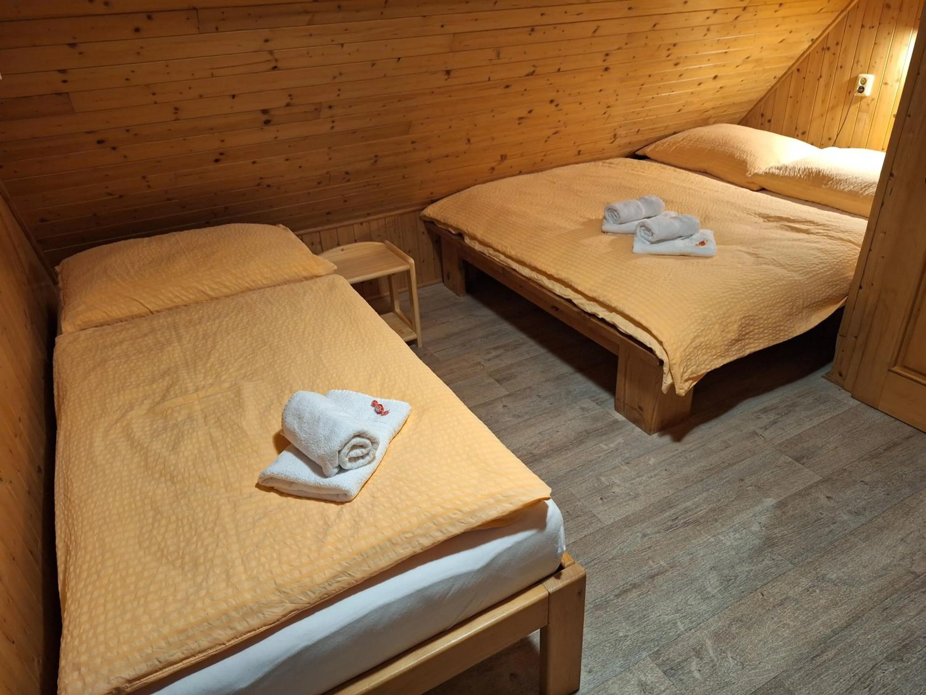 Bed in Apartmány U Žaloudků