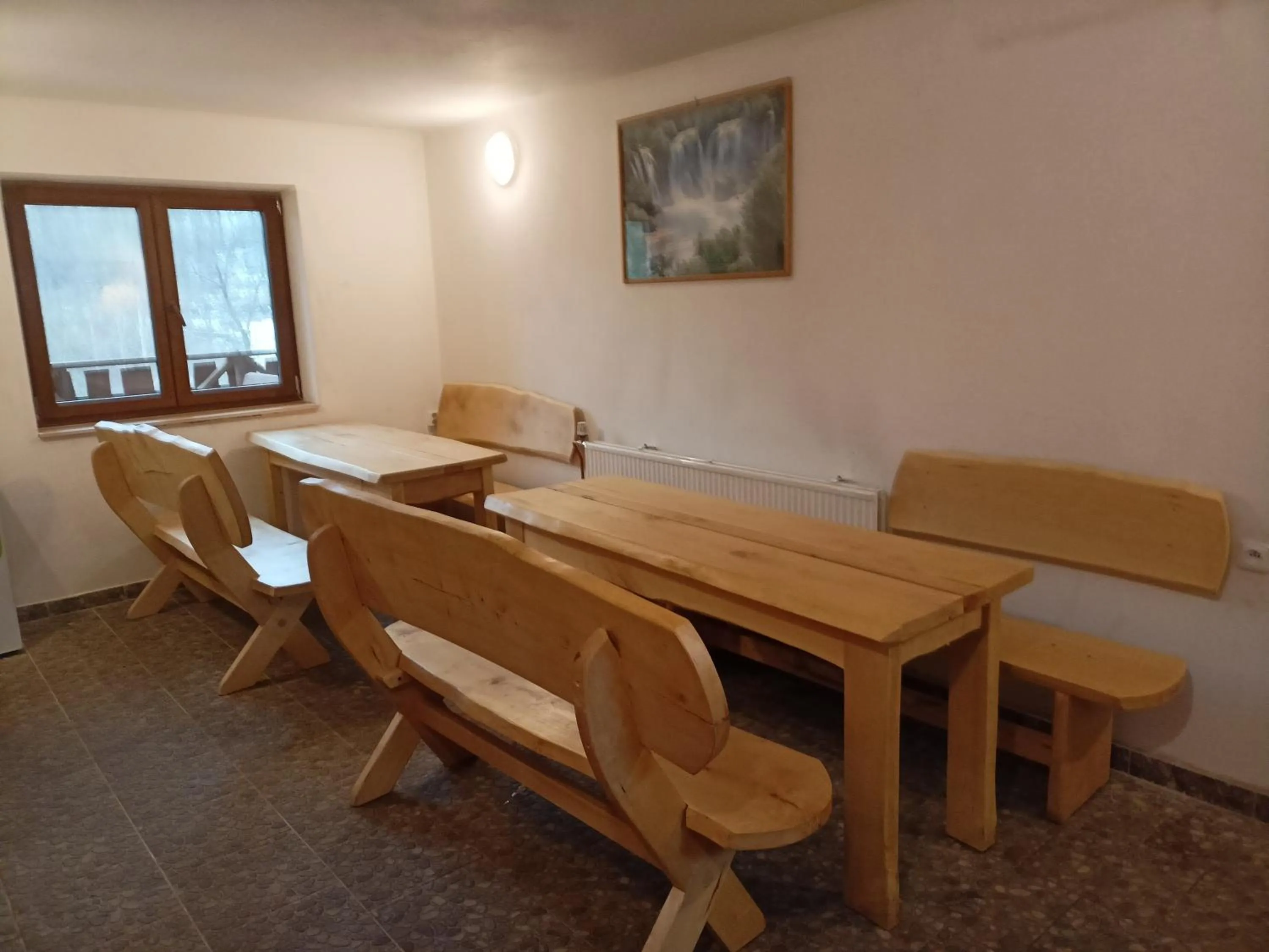 Communal lounge/ TV room in Apartmány U Žaloudků